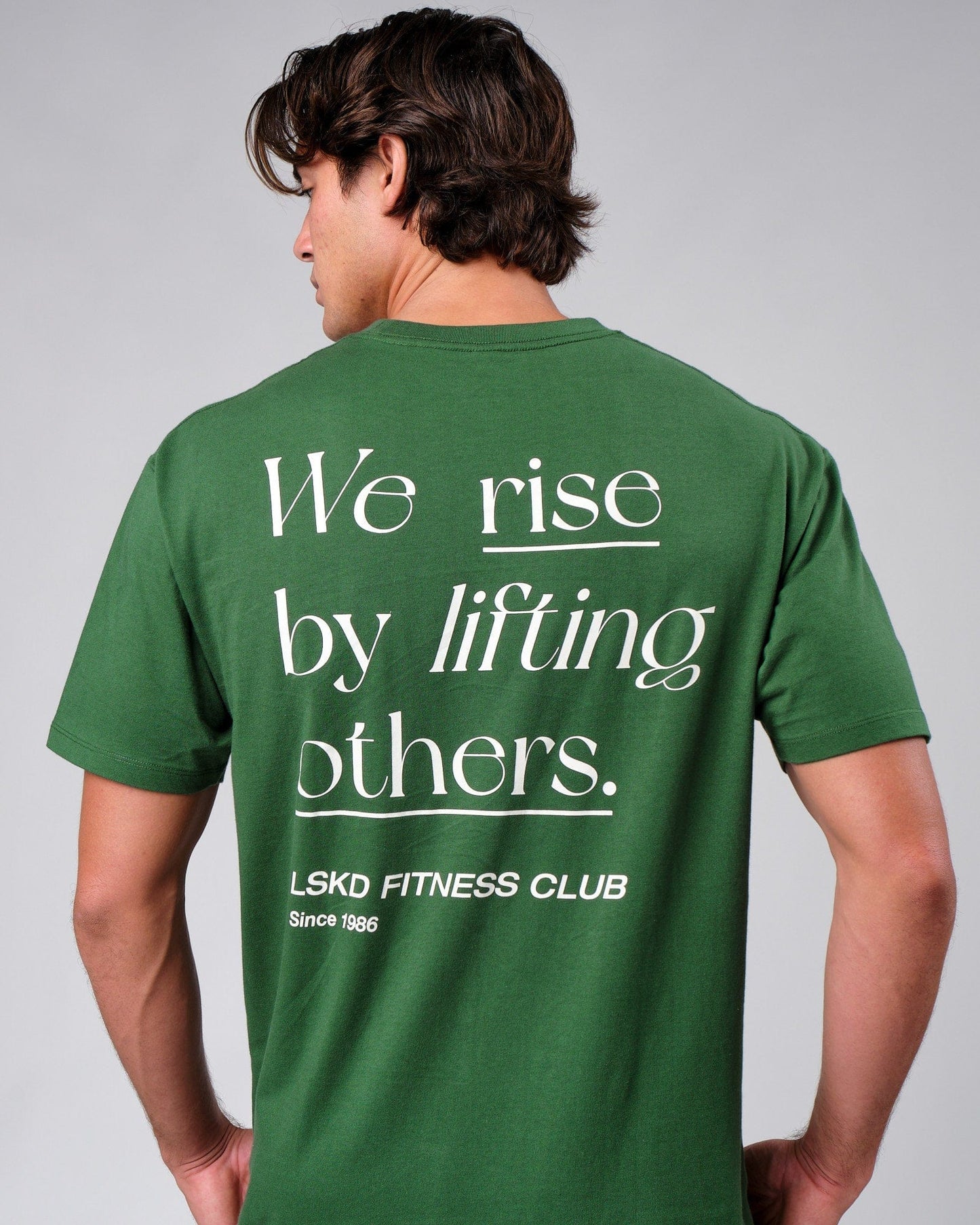 Model wearing Uplift Tee Oversize - Eden Green