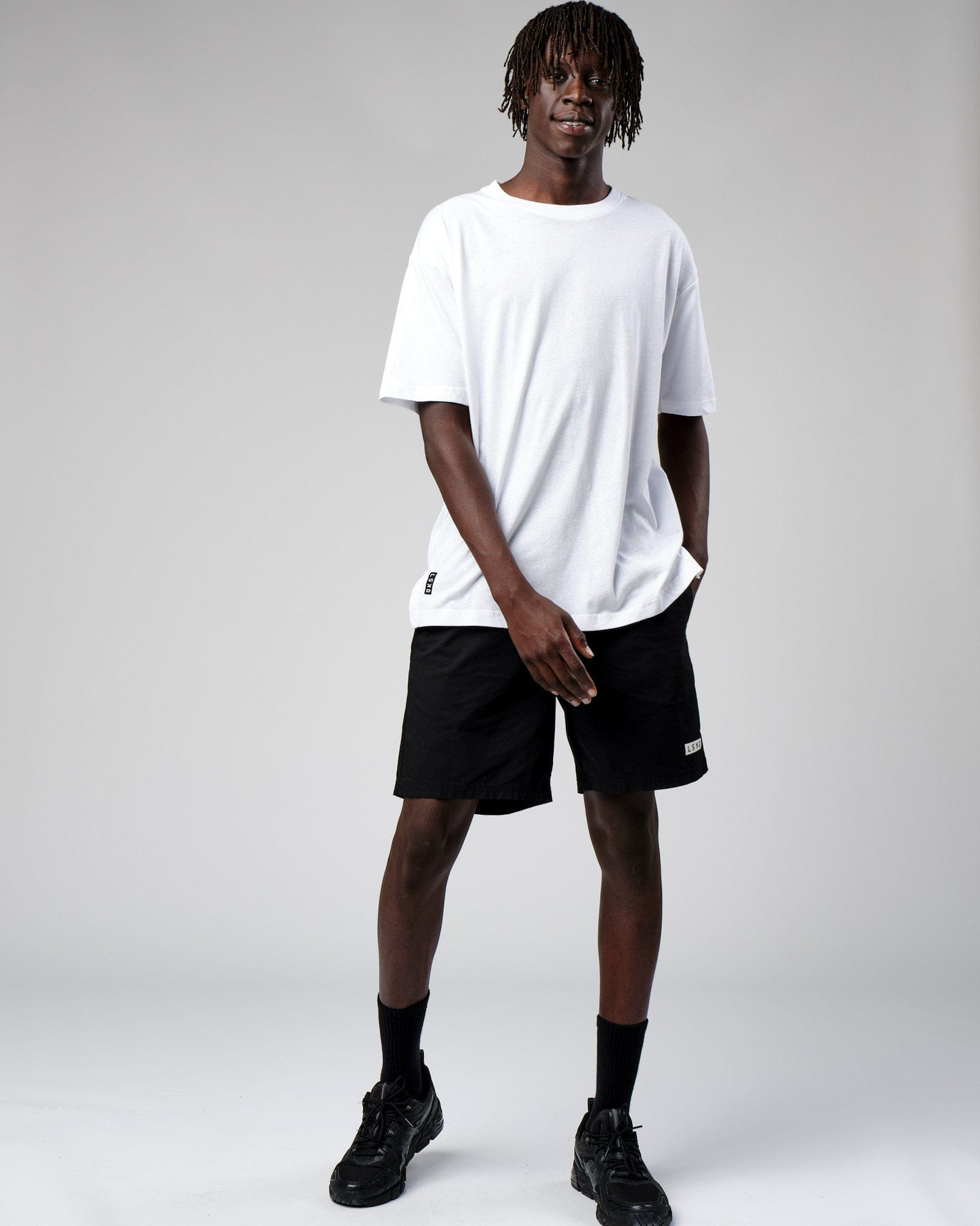 Model wearing Span Tee Oversize - White