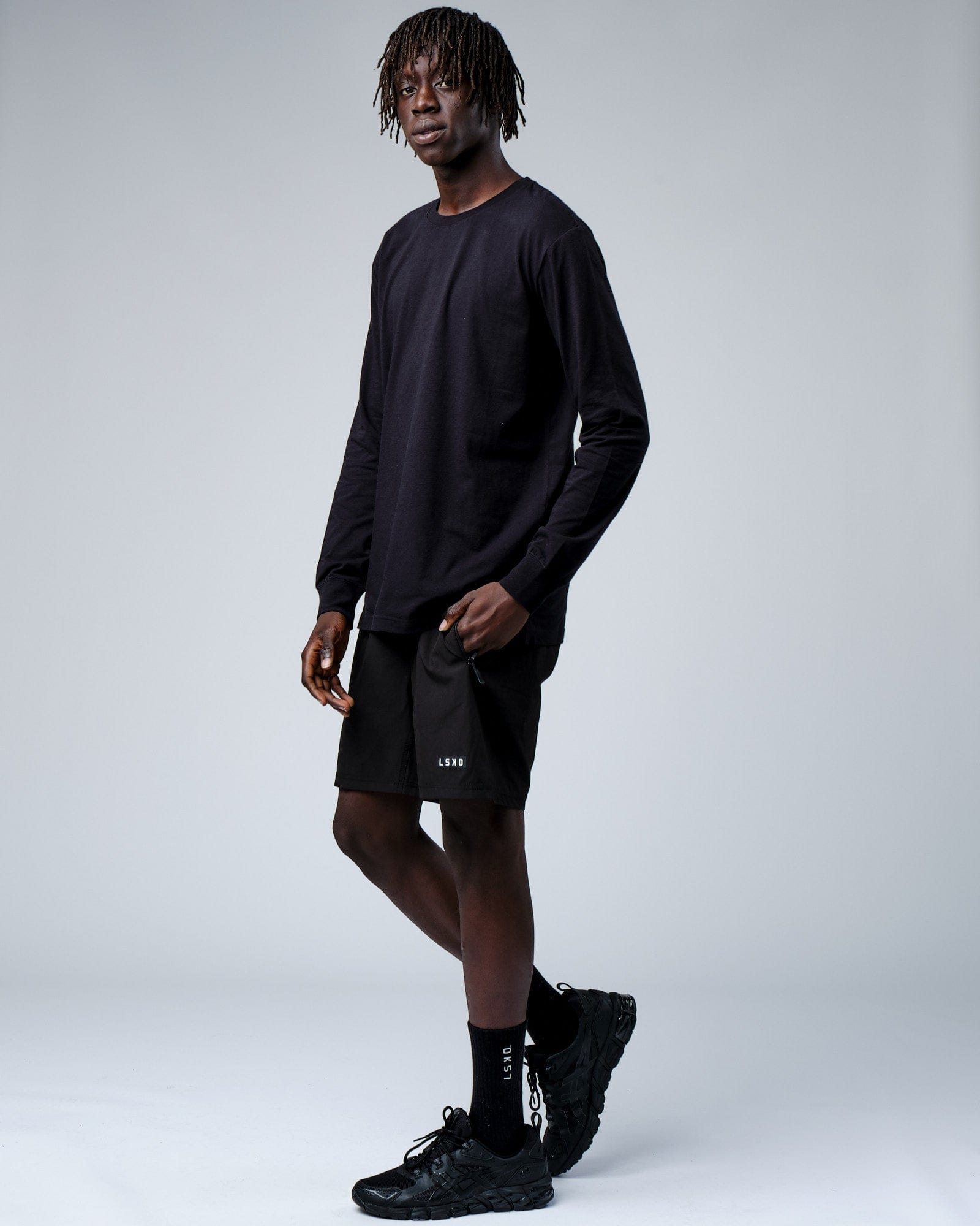 Model wearing Intensity FLXDRY Performance LS Tee - Black