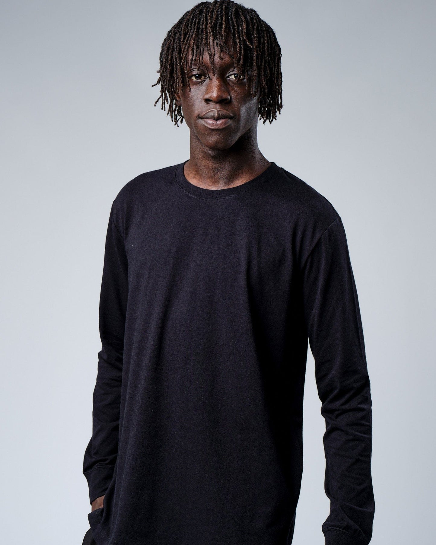 Model wearing Intensity FLXDRY Performance LS Tee - Black