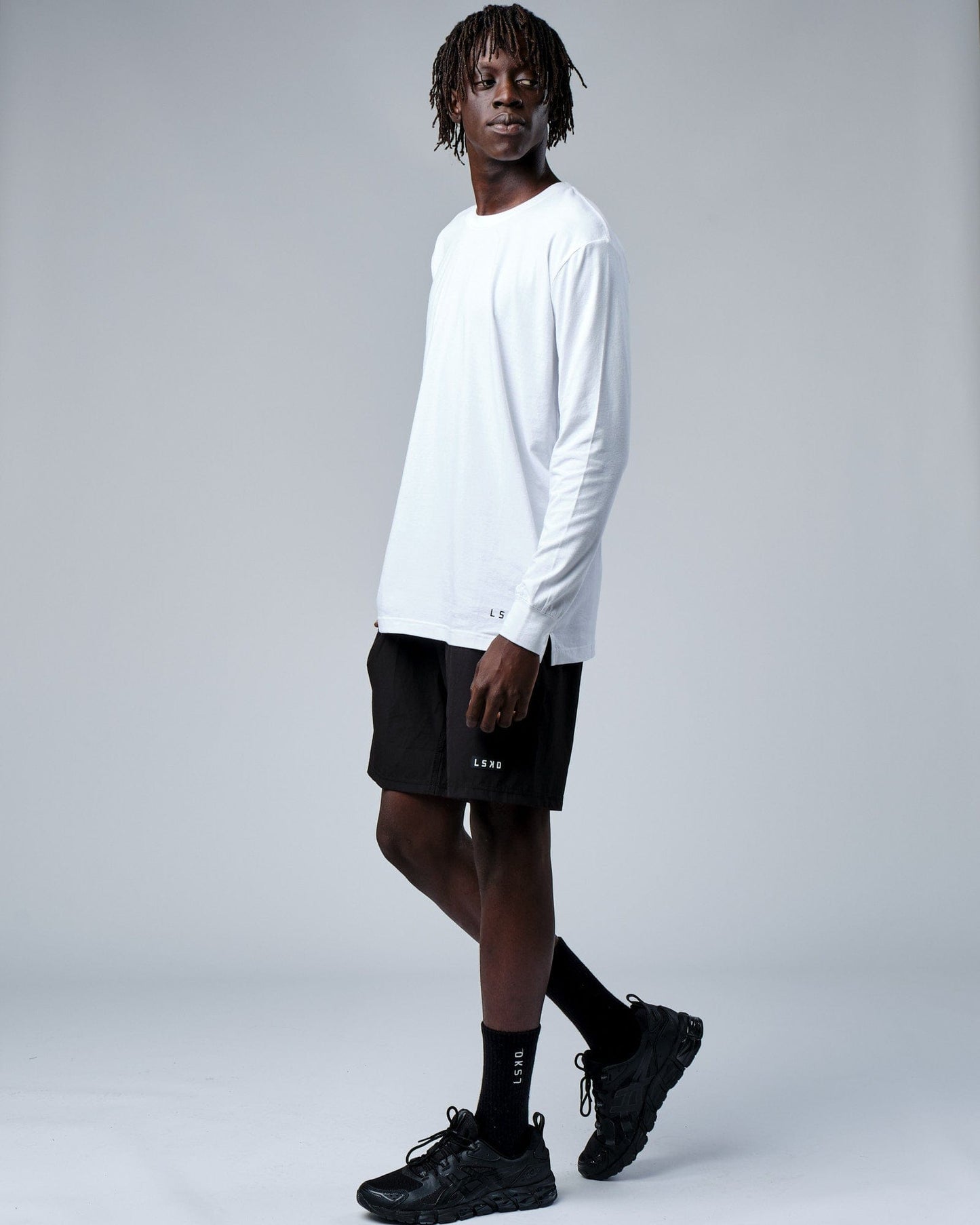 Model wearing Intensity FLXDRY Performance LS Tee - White