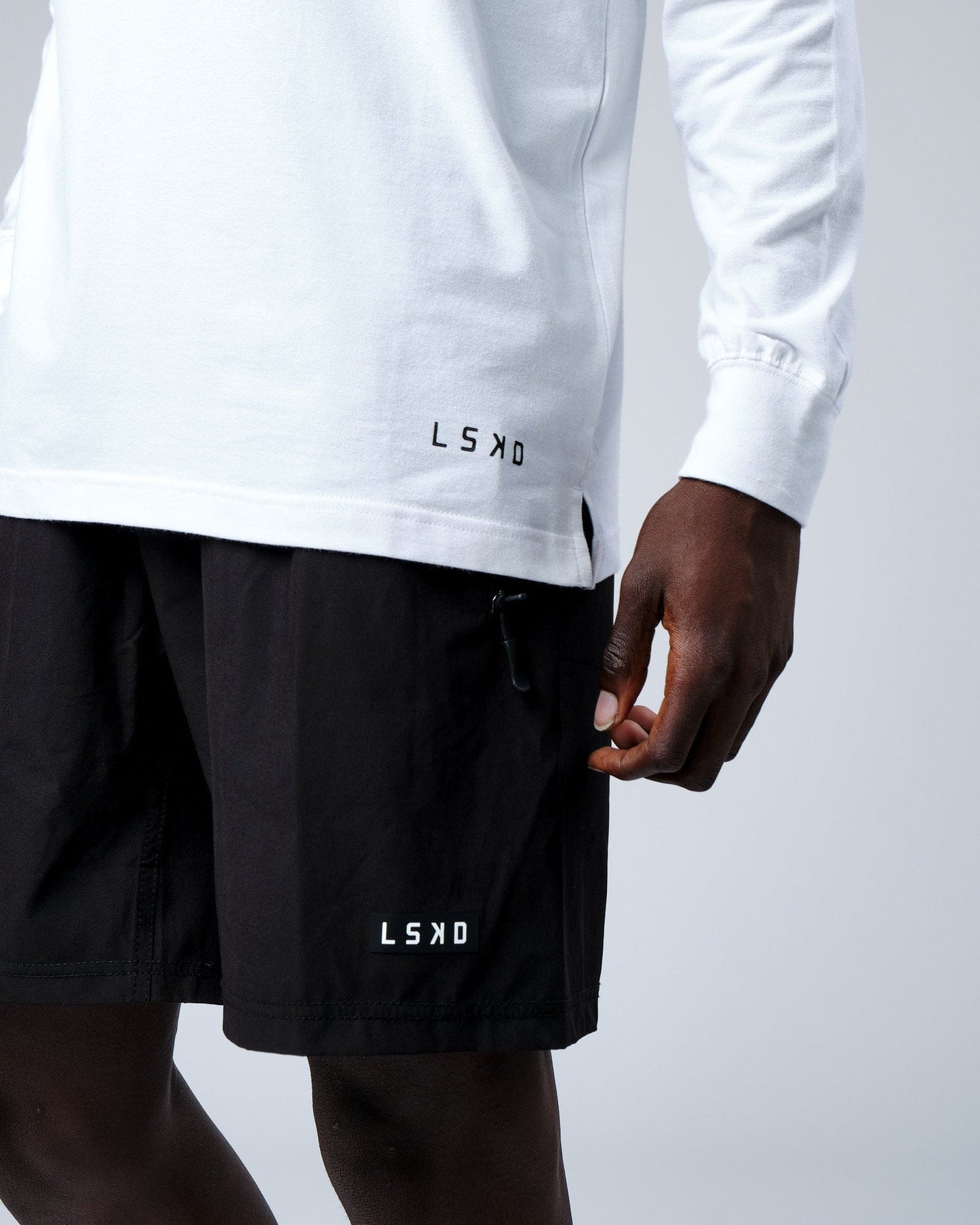 Model wearing Intensity FLXDRY Performance LS Tee - White