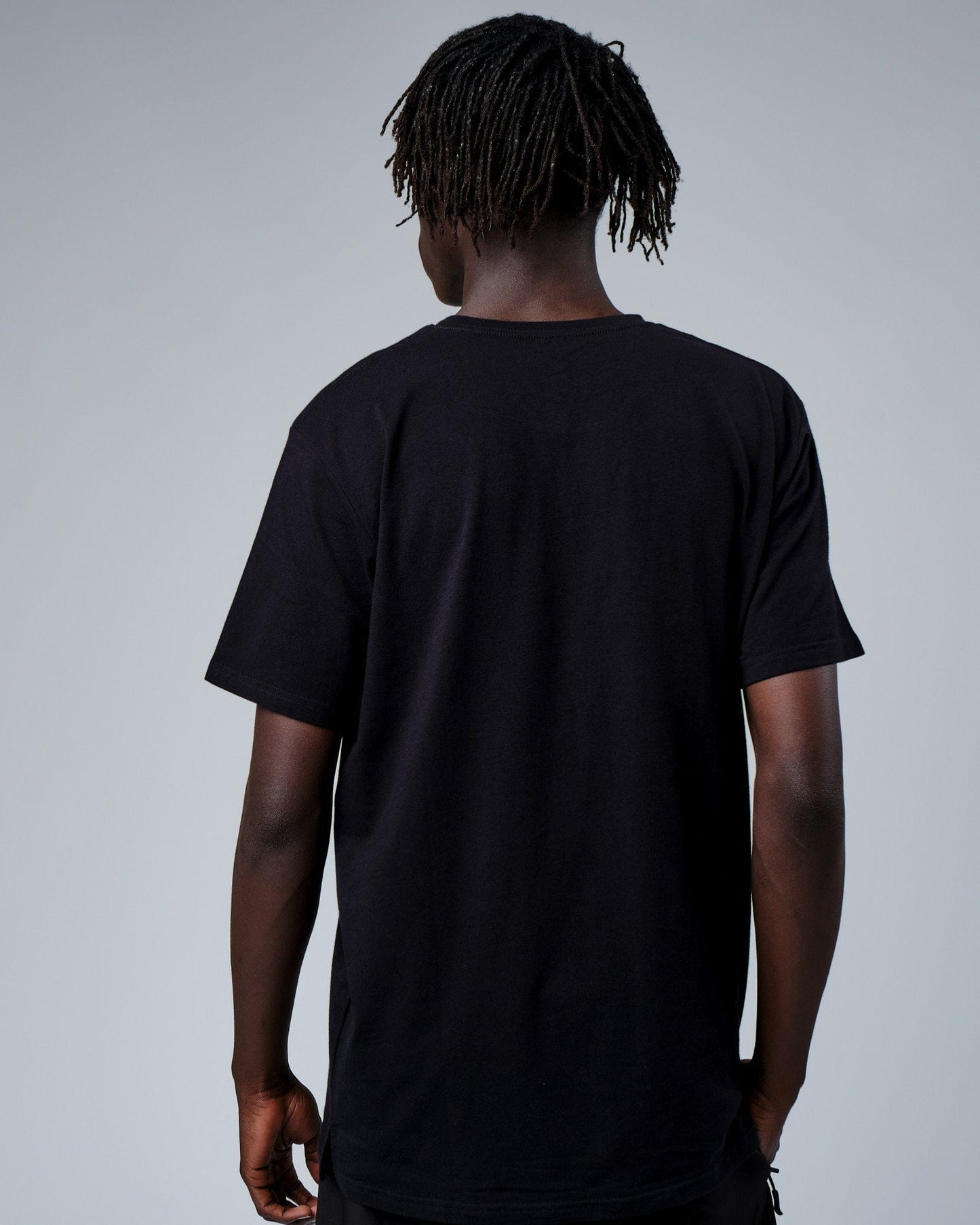 Model wearing Intensity FLXDRY Performance Tee - Black