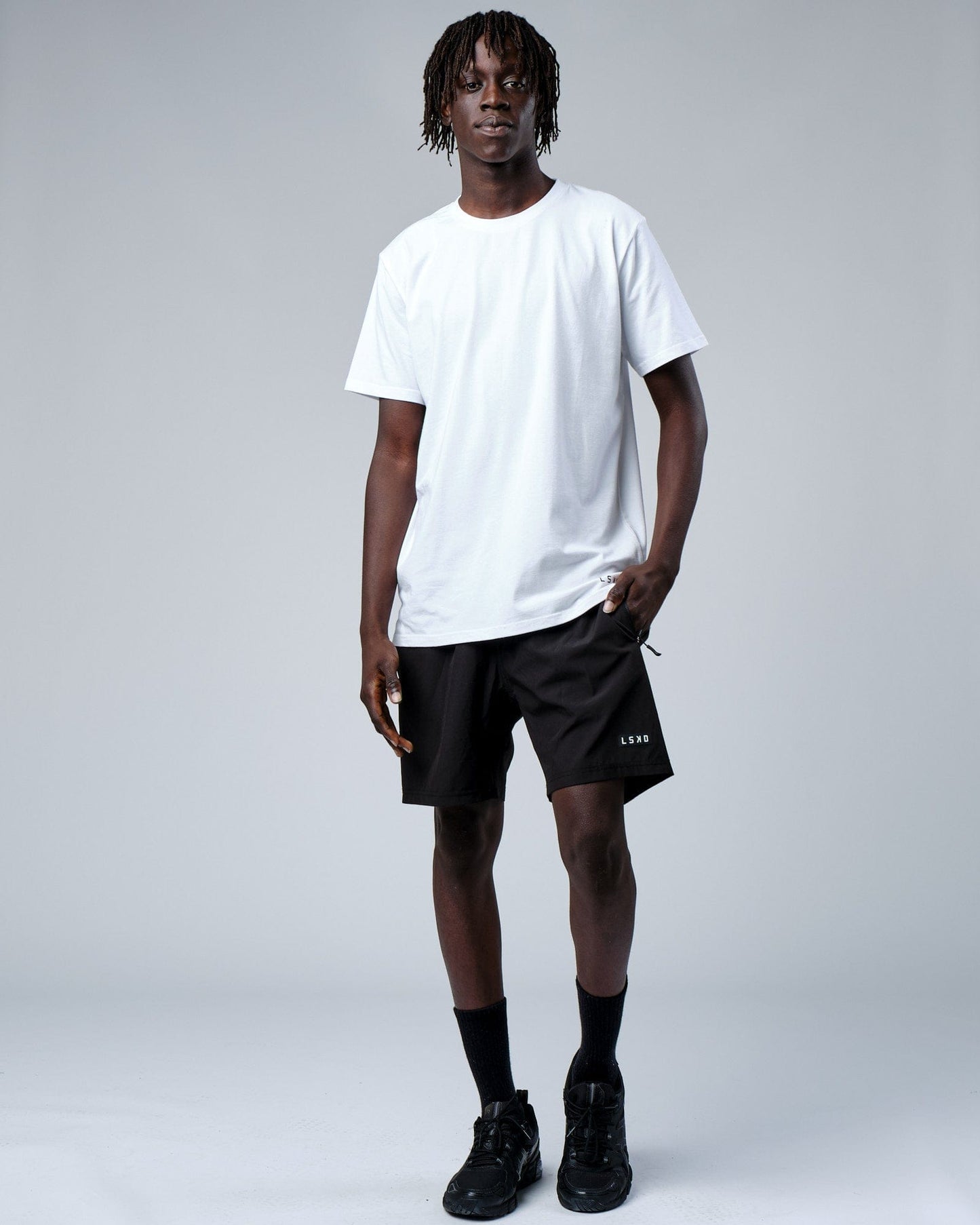 Model wearing Intensity FLXDRY Performance Tee - White