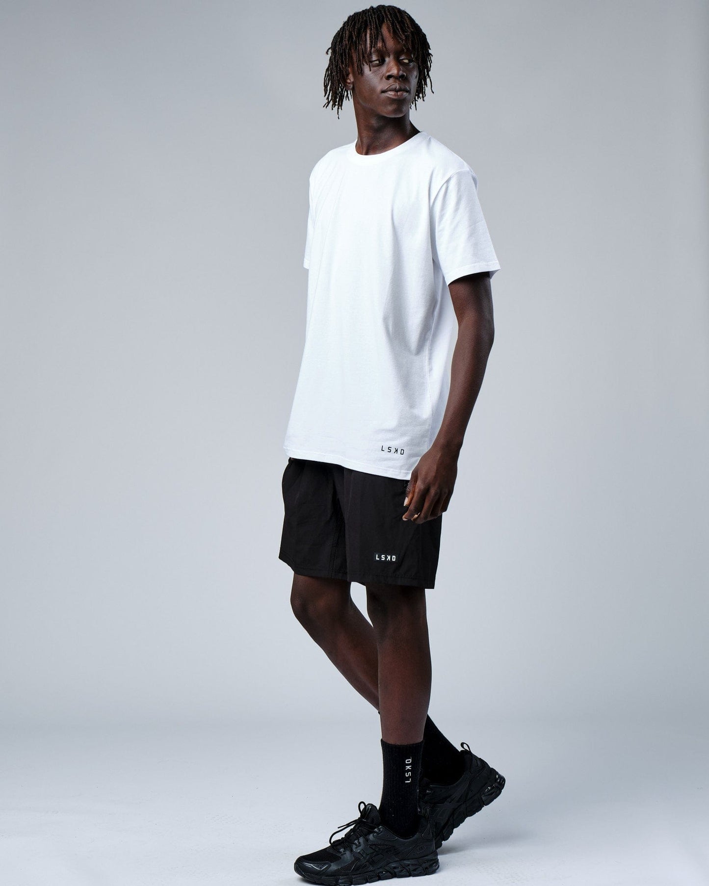 Model wearing Intensity FLXDRY Performance Tee - White