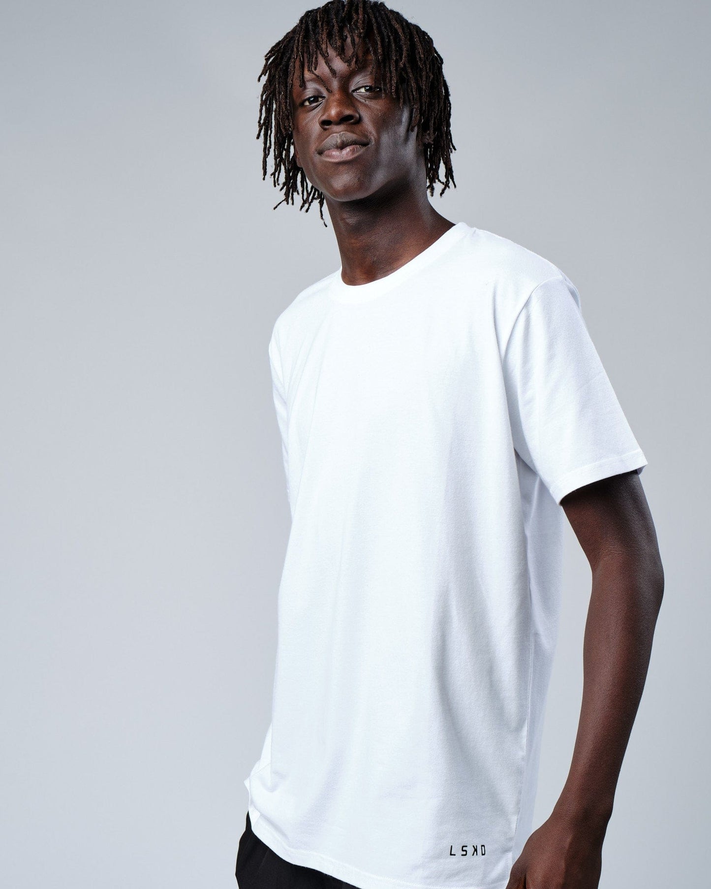 Model wearing Intensity FLXDRY Performance Tee - White