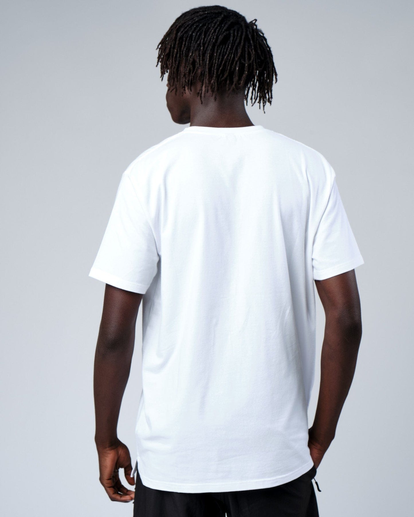 Model wearing Intensity FLXDRY Performance Tee - White