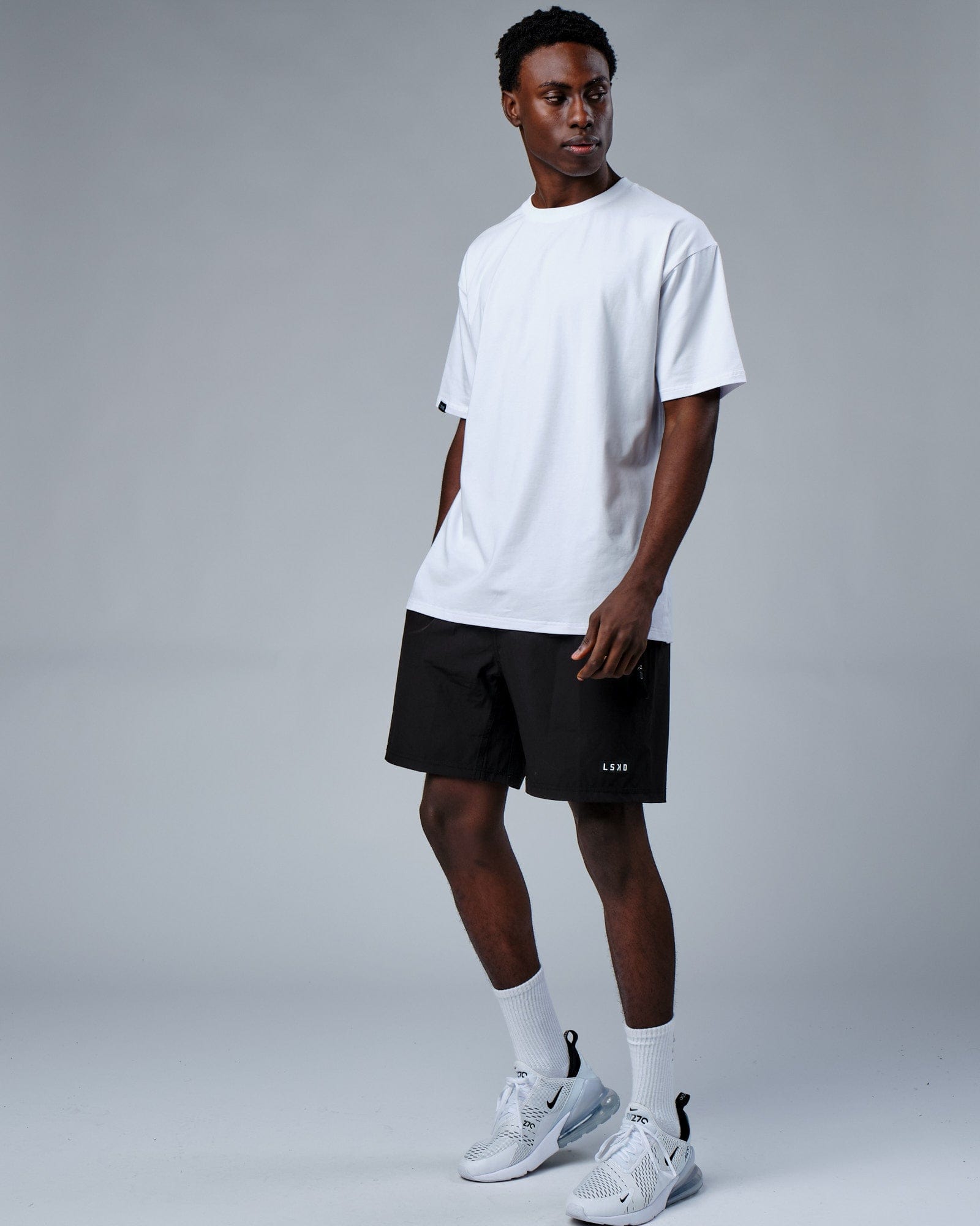 Model wearing HQ FLXCotton Tee Oversize - White-Red