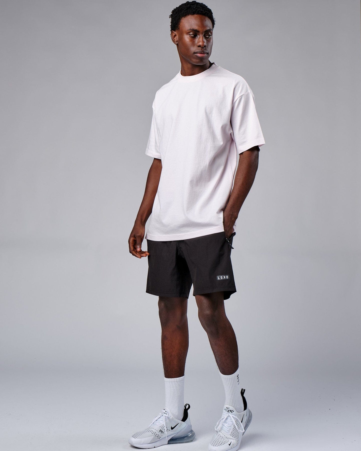 Model wearing Laps Tee Oversize - Orchid Ice