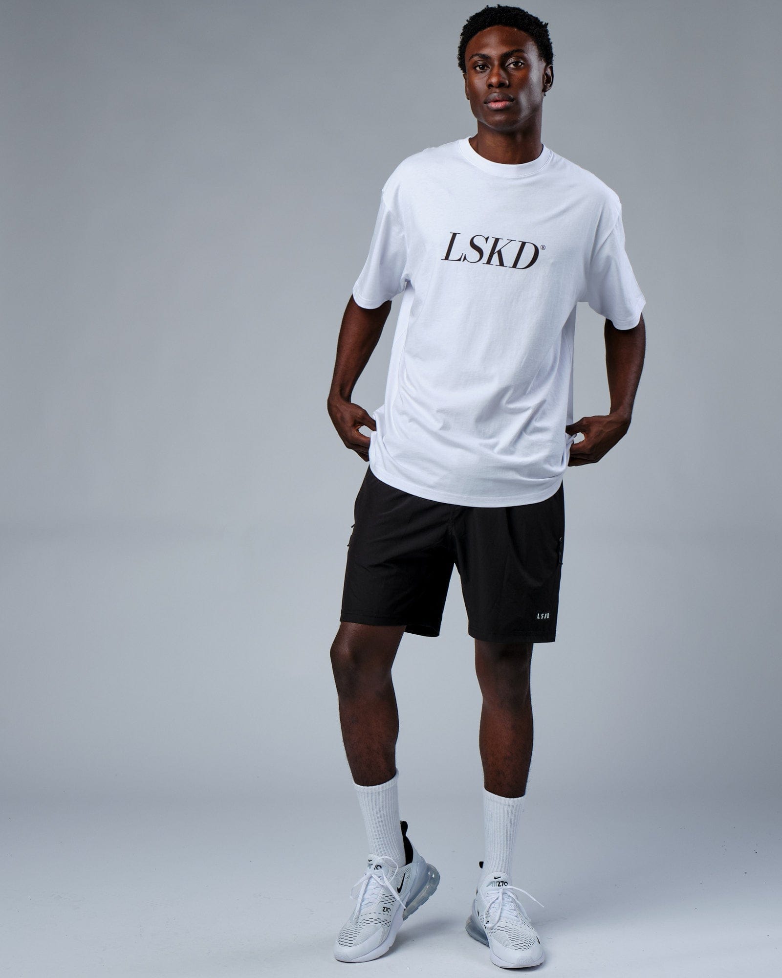 Model wearing IT Tee Oversize - White-Walnut