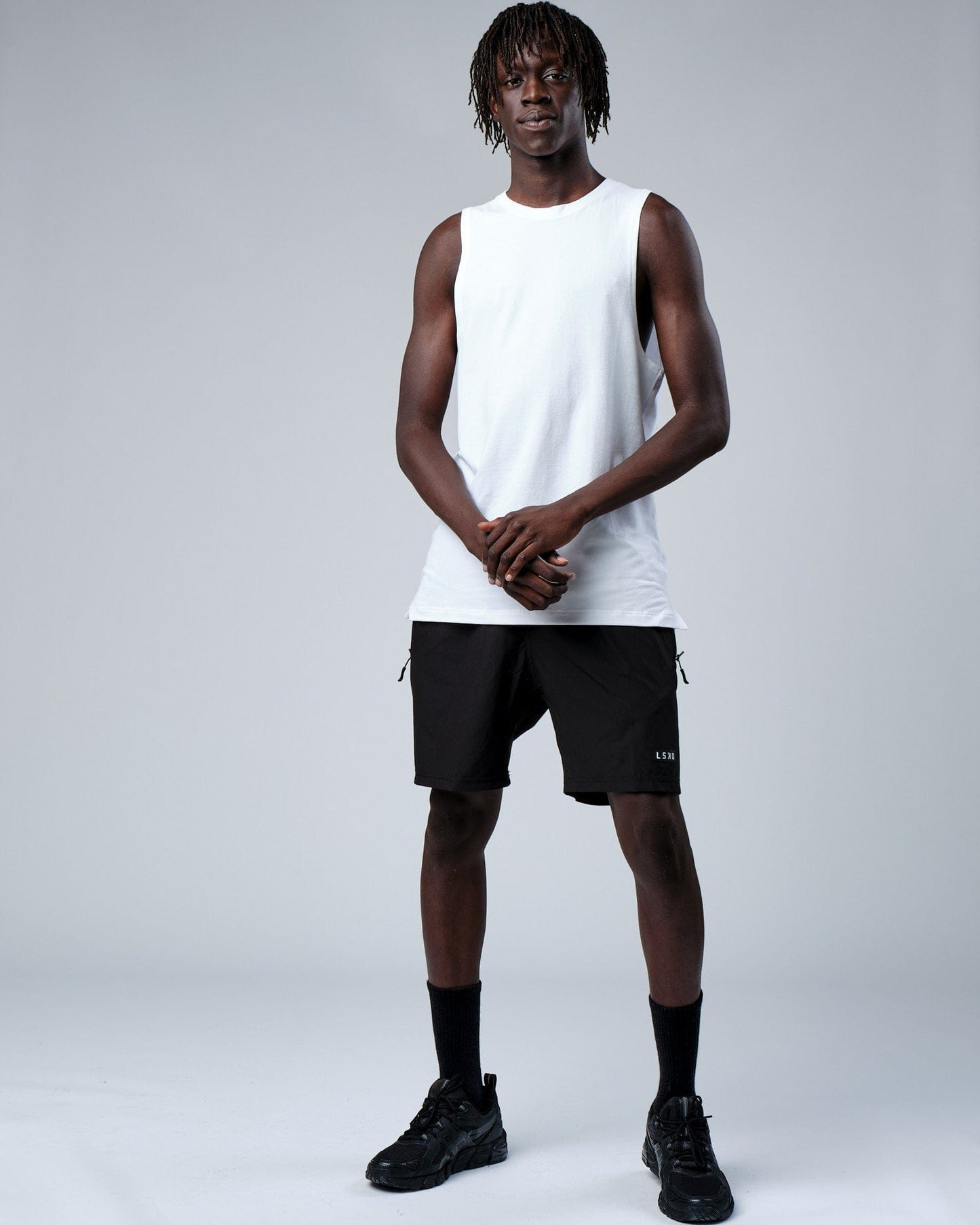 Model wearing Rival FLXCotton Training Fit Tank - White