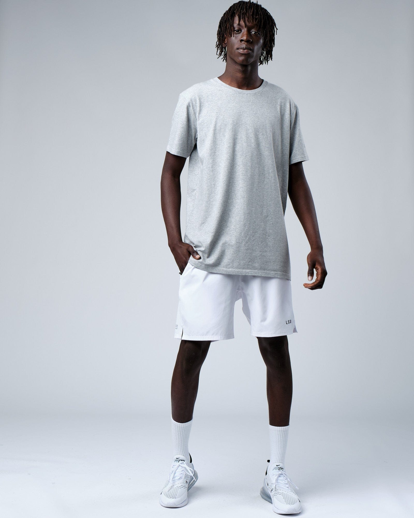 Model wearing Rival FLXCotton Training Fit Tee - Lt Grey Marl