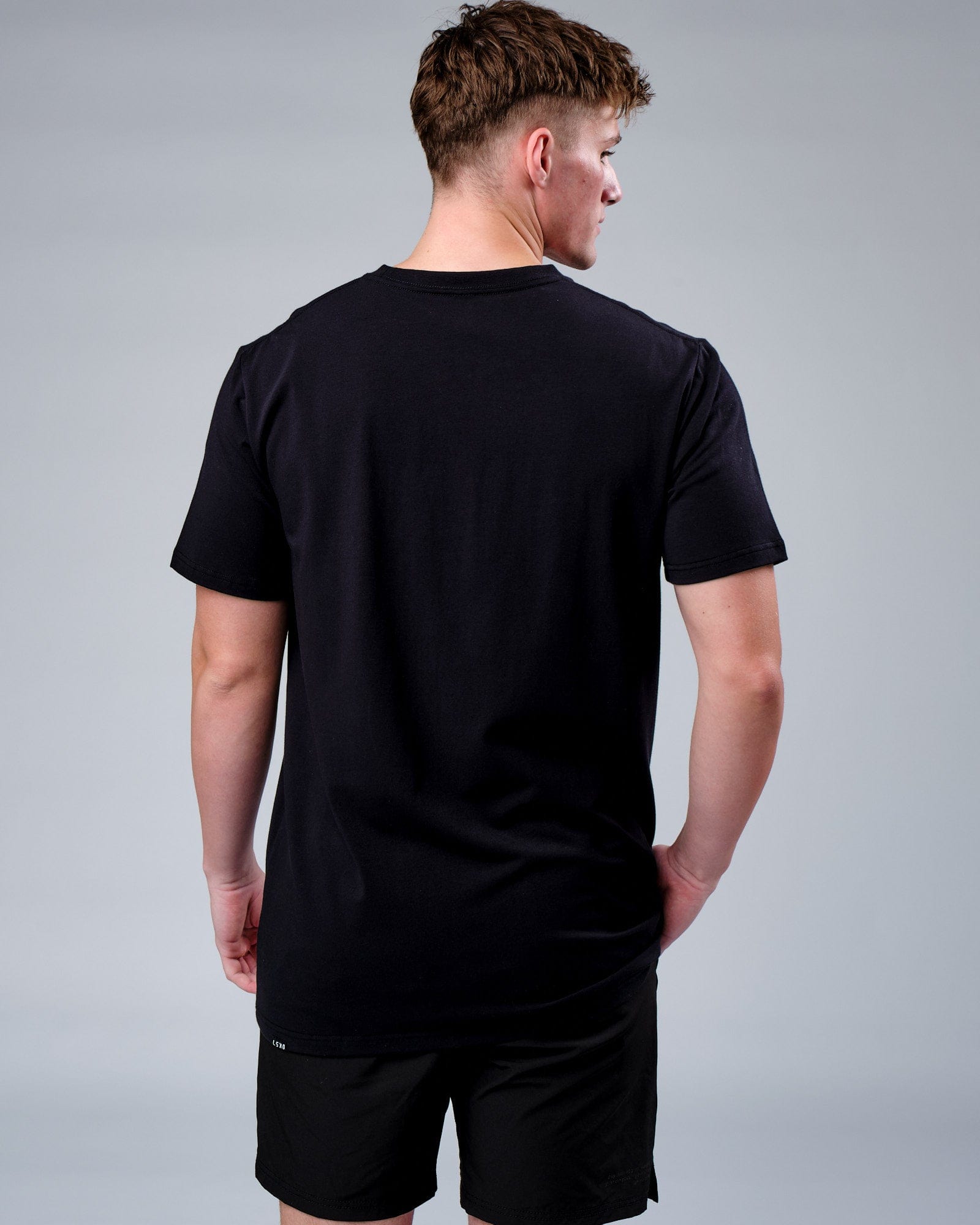 Model wearing Rep FLXCotton Tee - Black-Black Camo