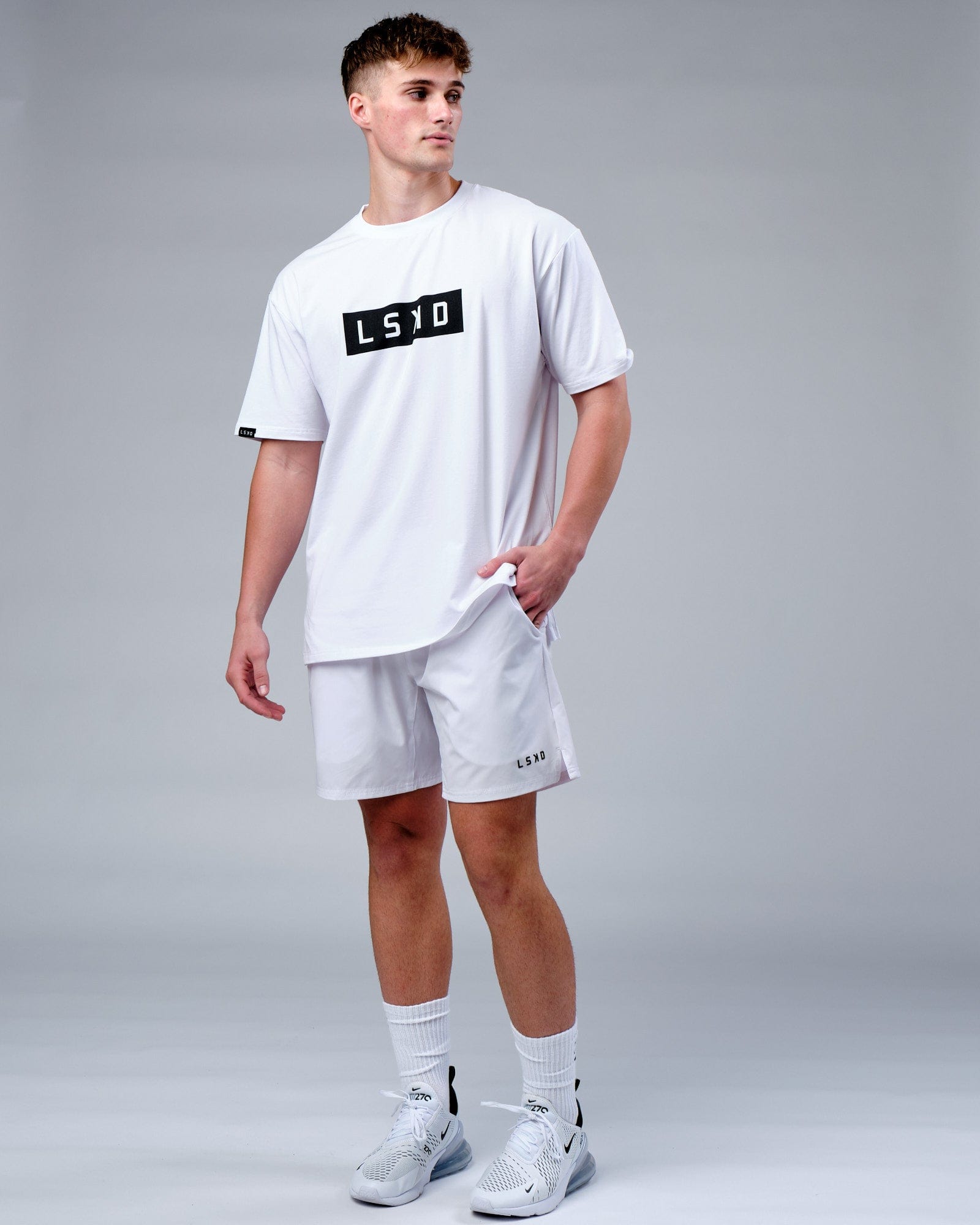 Model wearing Mood FLX Cotton Tee Oversize - White-Black