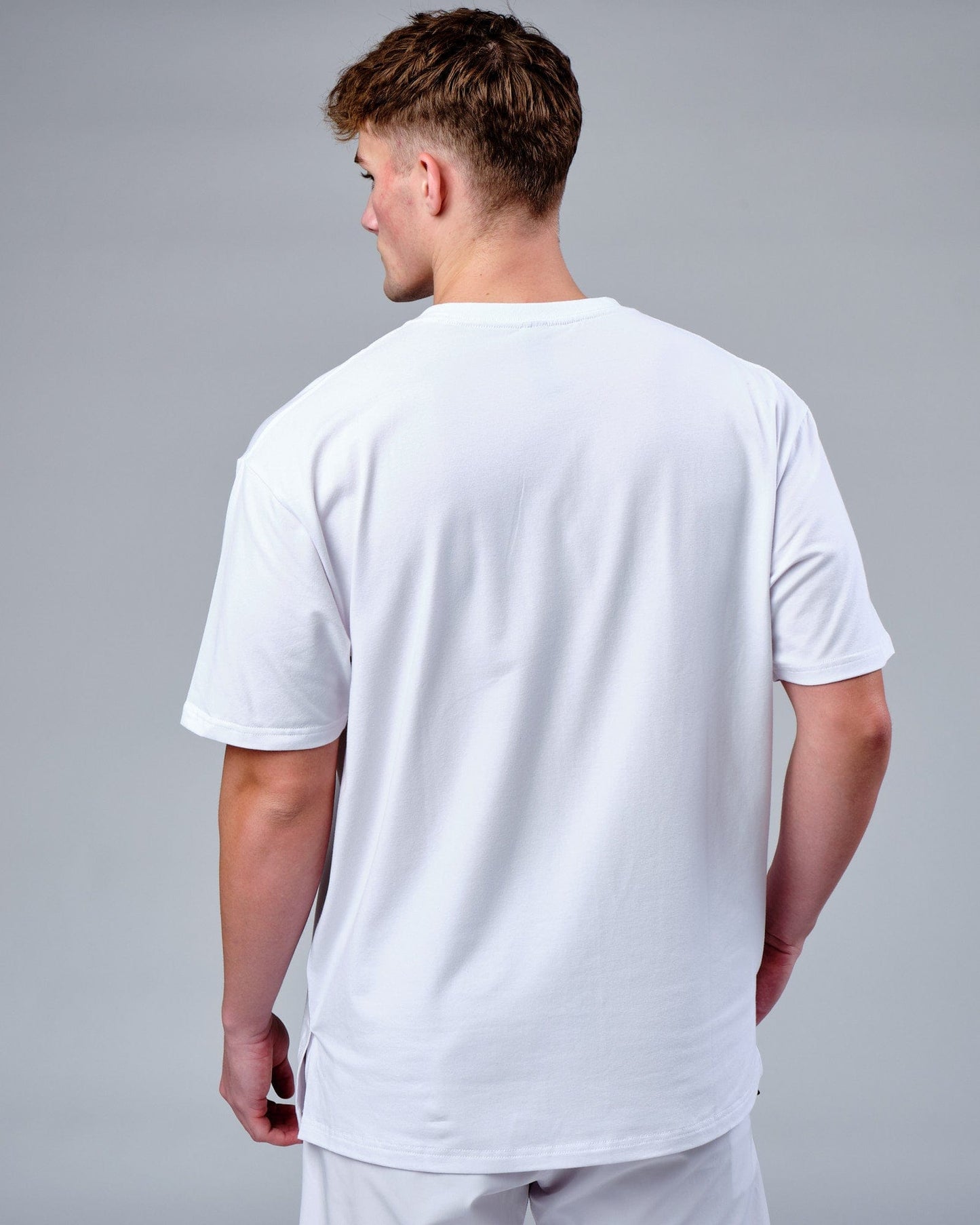 Model wearing Mood FLX Cotton Tee Oversize - White-Black