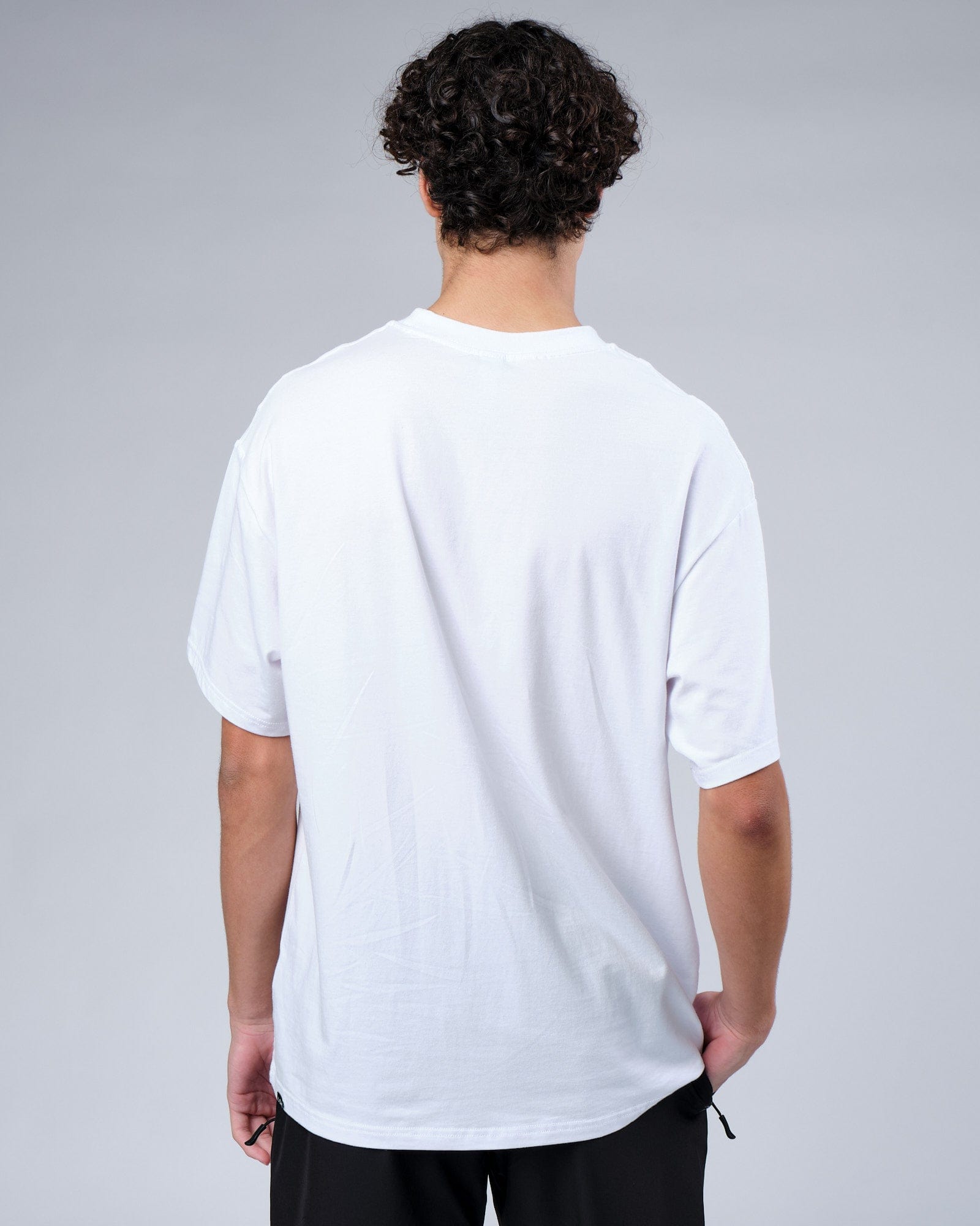 Model wearing Progress FLXCotton Tee Oversize - White