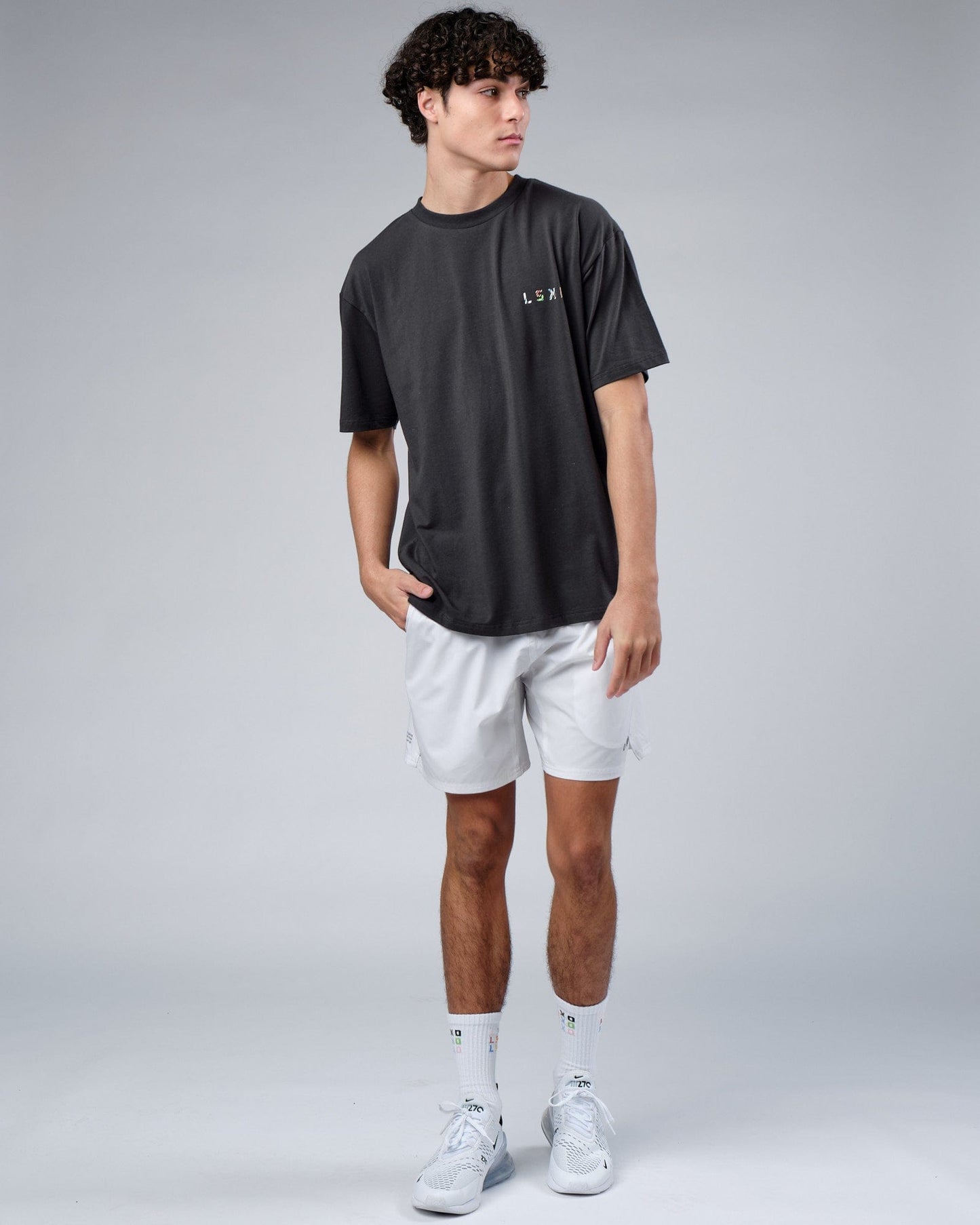 Model wearing Unity FLXCotton Tee Oversize - Pirate Black