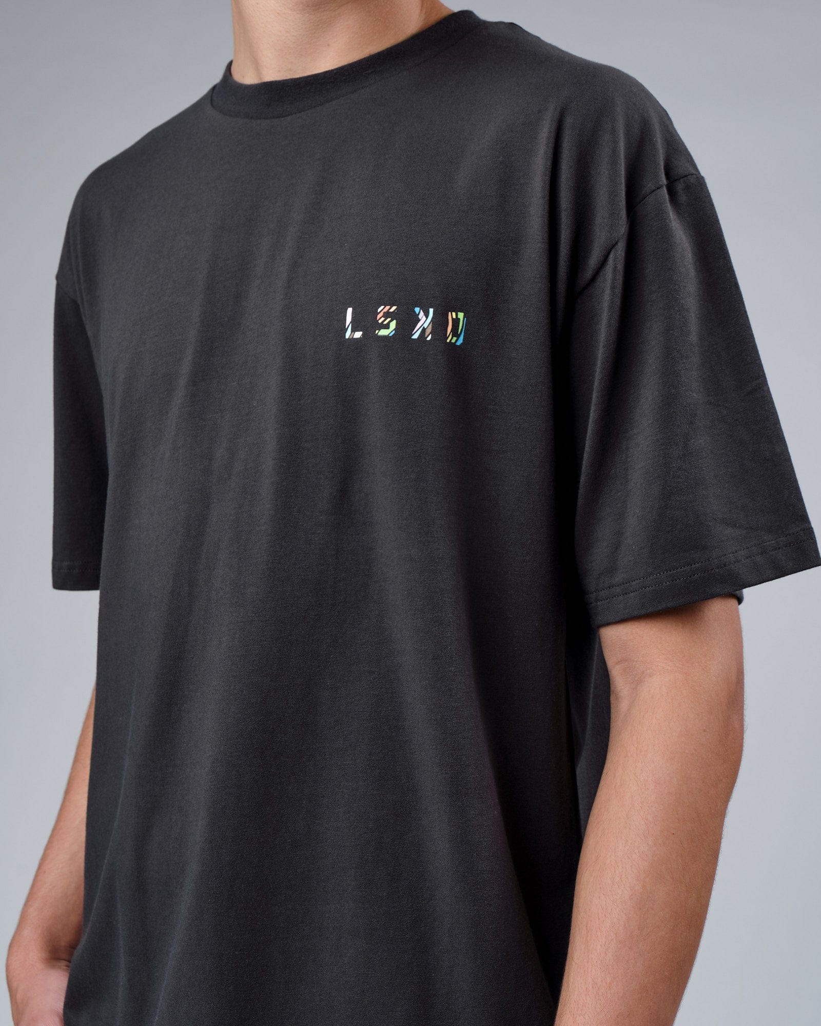 Model wearing Unity FLXCotton Tee Oversize - Pirate Black