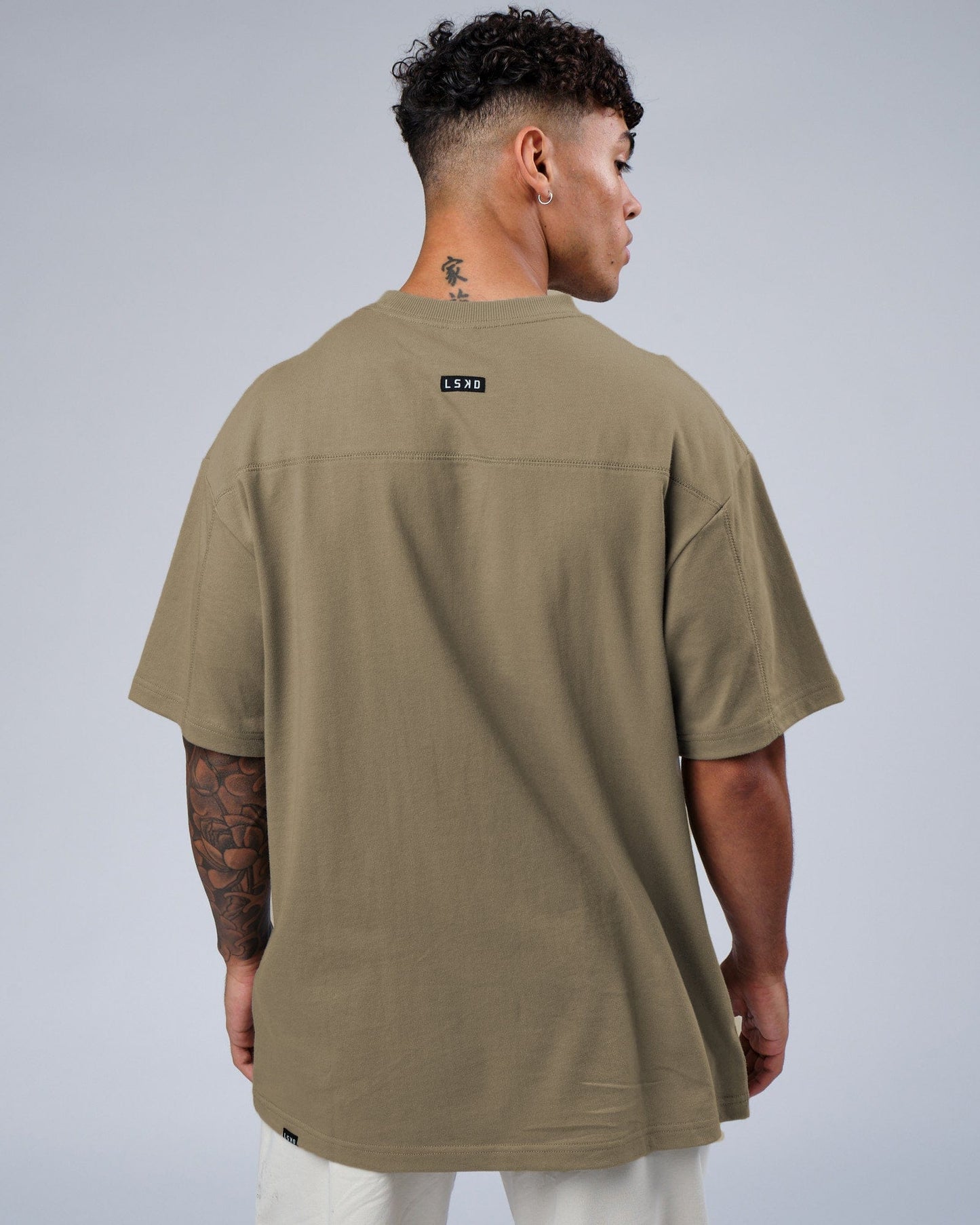 Model wearing Heavy Hitter Heavyweight Tee Oversize - Laurel Oak