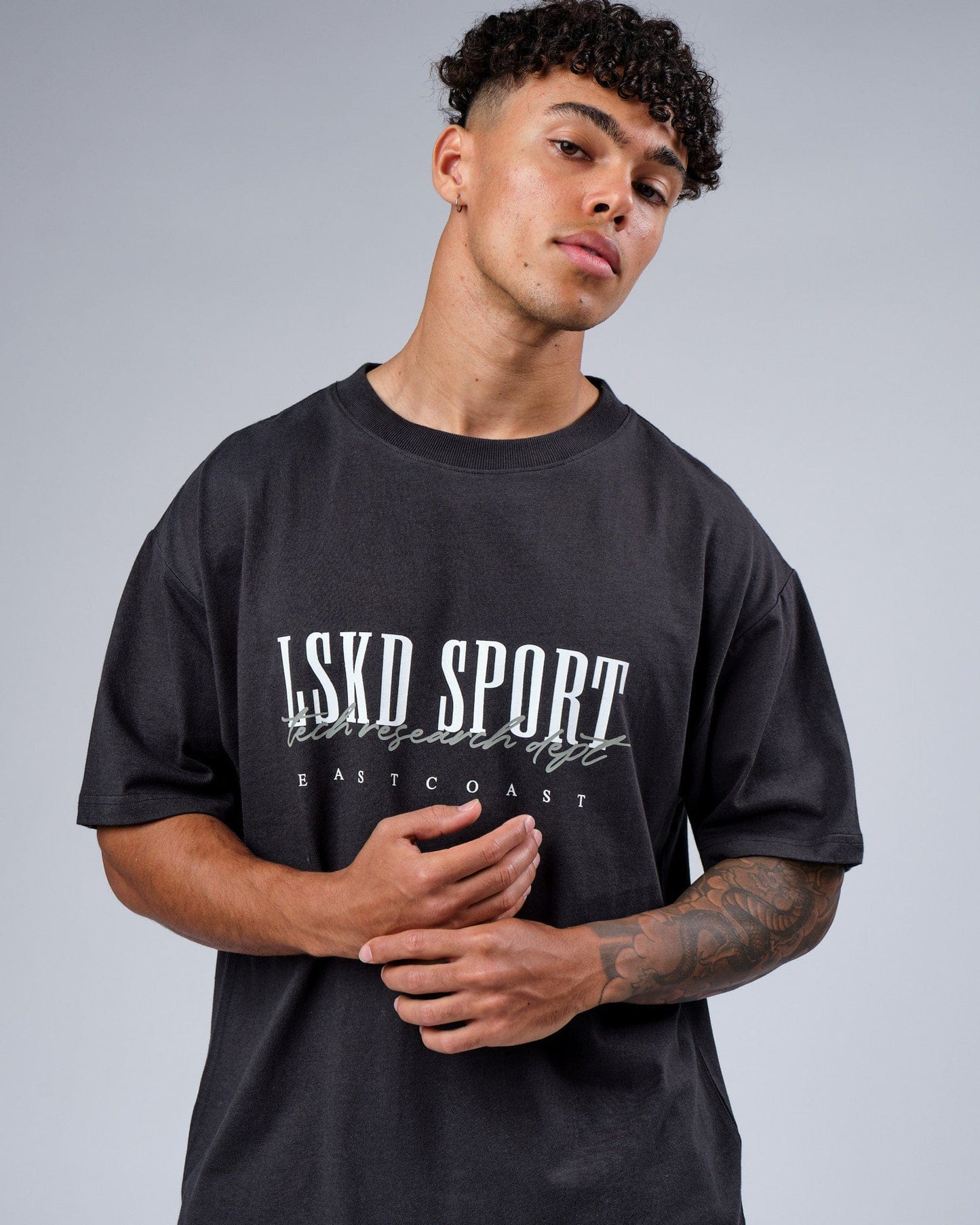 Model wearing Faculty Tee Vintage Fit - Phantom