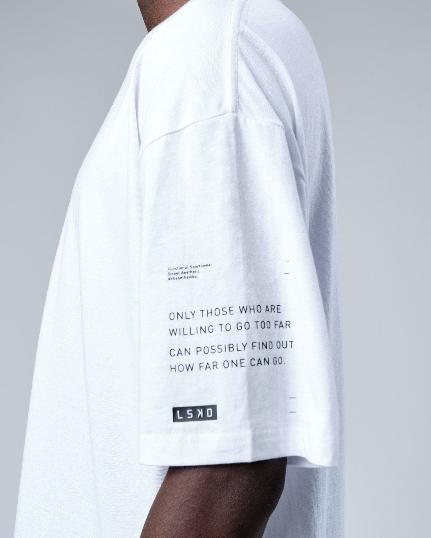 Model wearing Effort Tee Oversize - White
