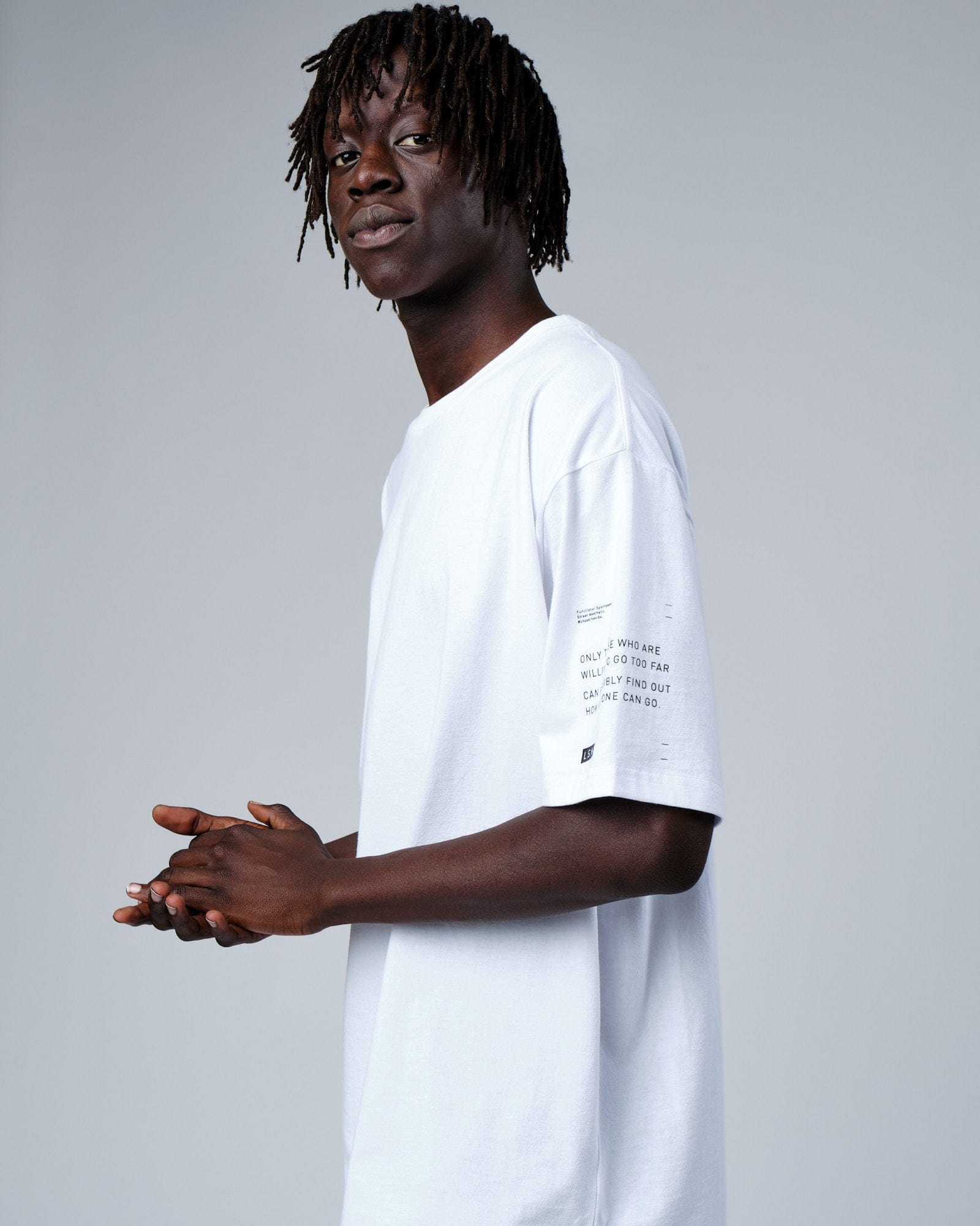 Model wearing Effort Tee Oversize - White