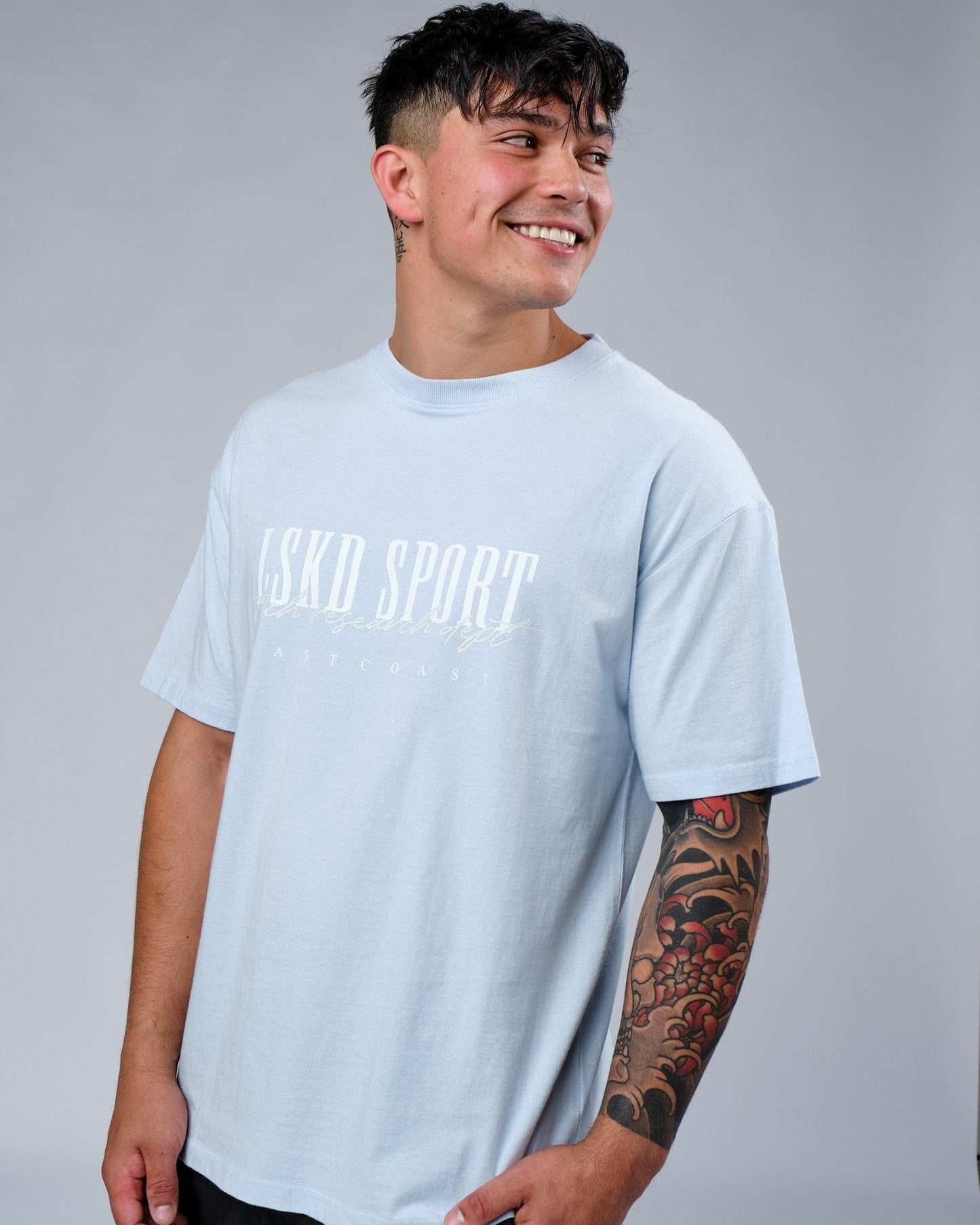 Model wearing Faculty Tee Vintage Fit - Sky Blue