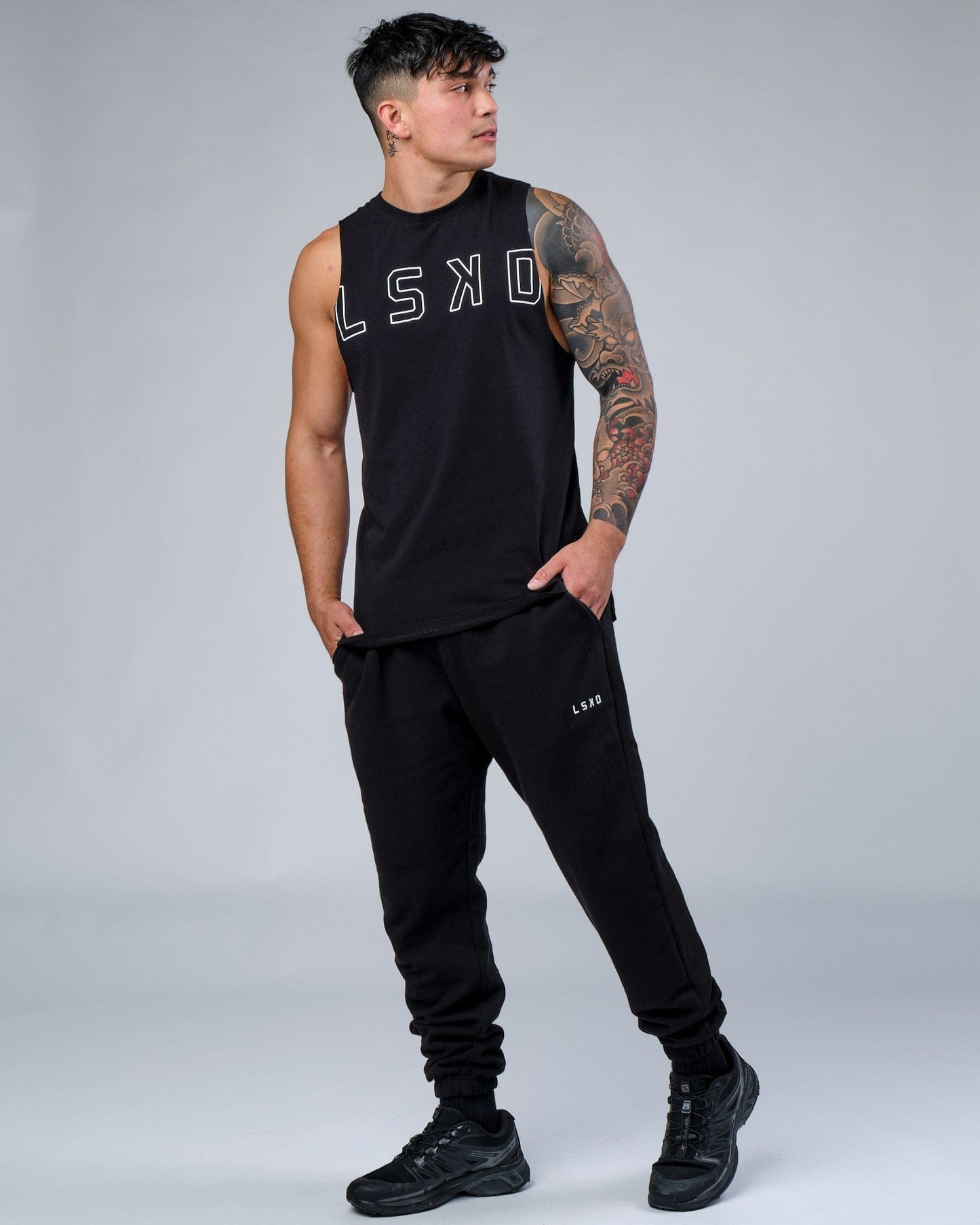 Model wearing Expand FLXCotton Training Fit Tank - Black