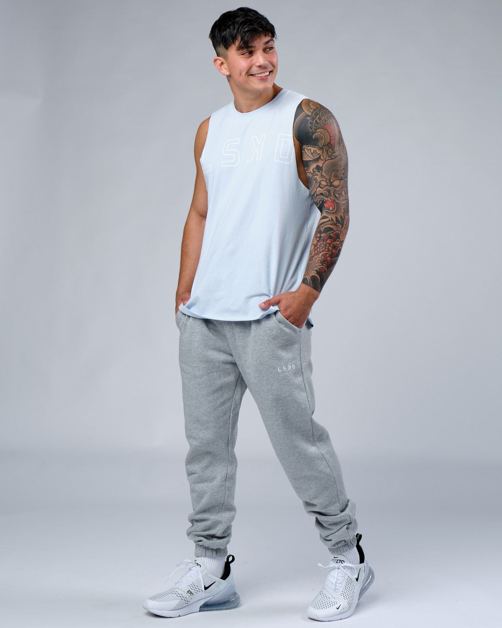 Model wearing Expand FLXCotton Training Fit Tank - Sky Blue