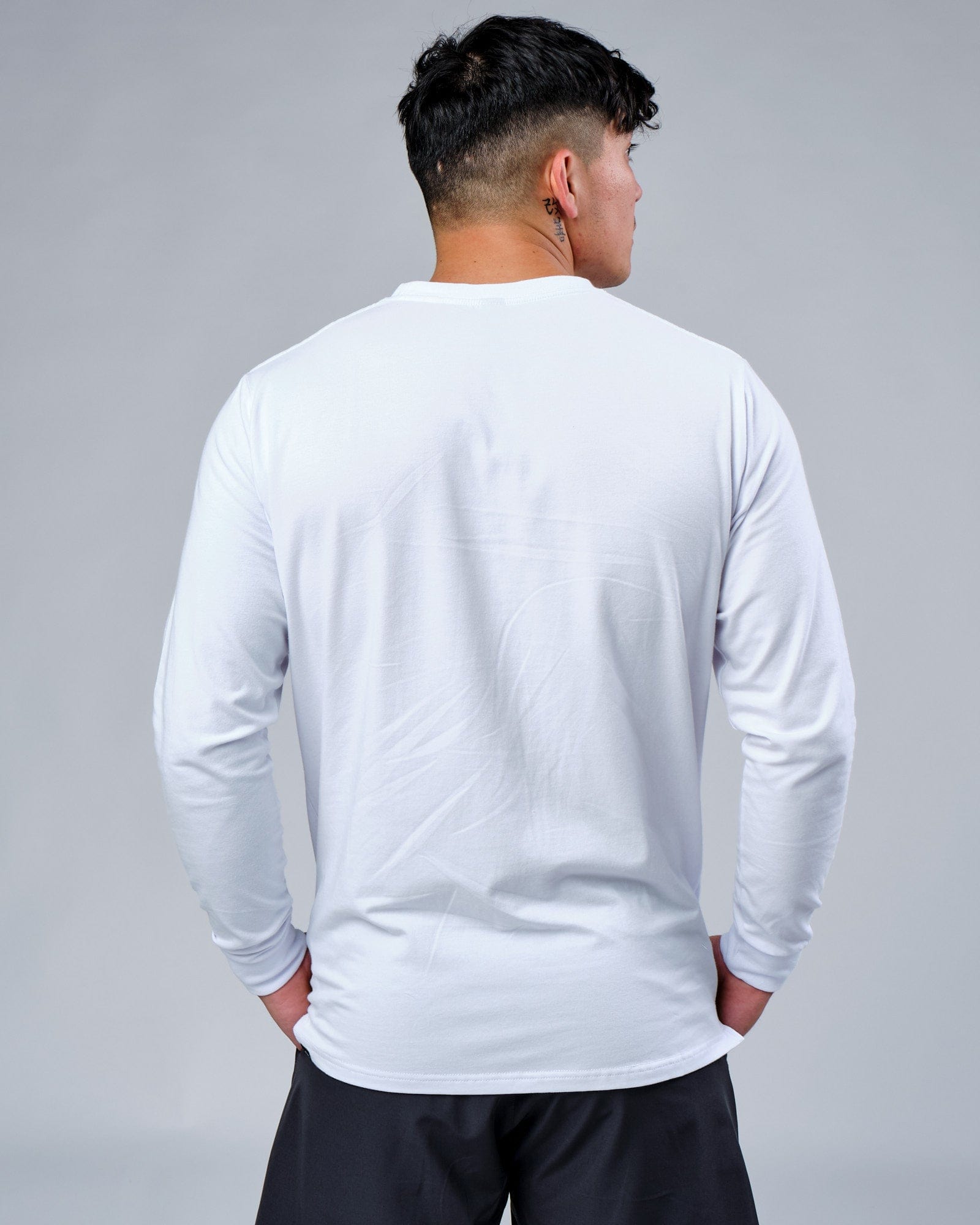 Model wearing Expand FLXCotton LS Tee - White