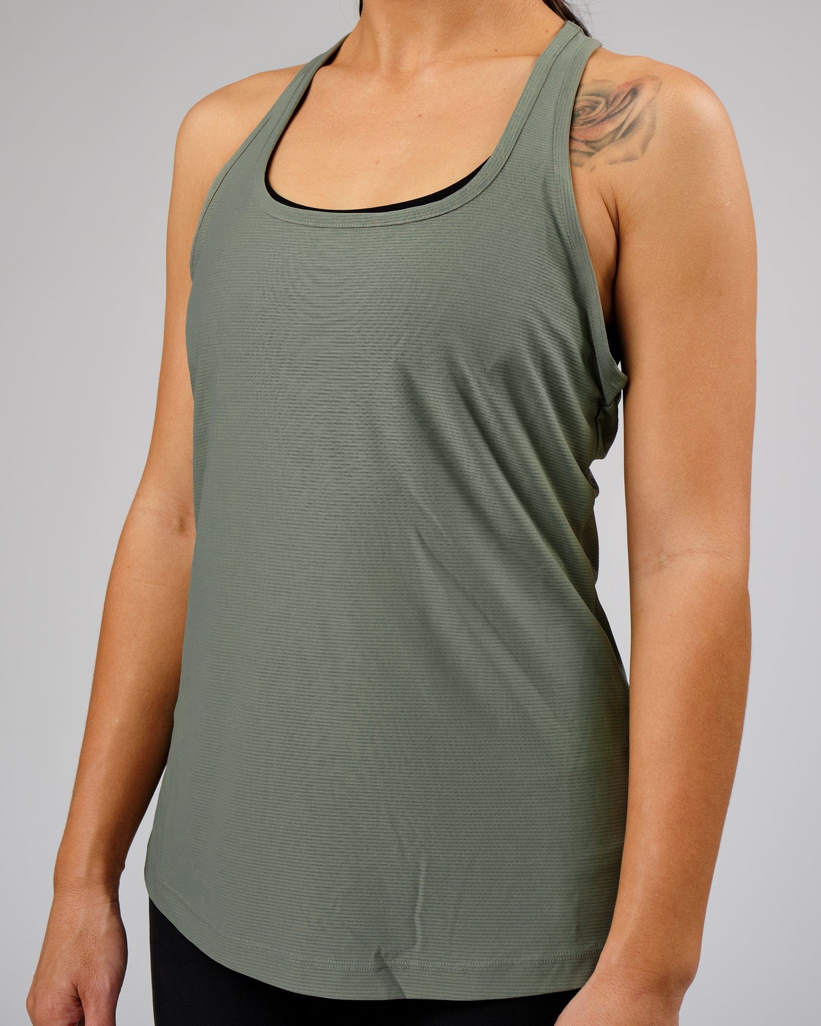 Model wearing Freedom Performance Tank - Dusty Olive