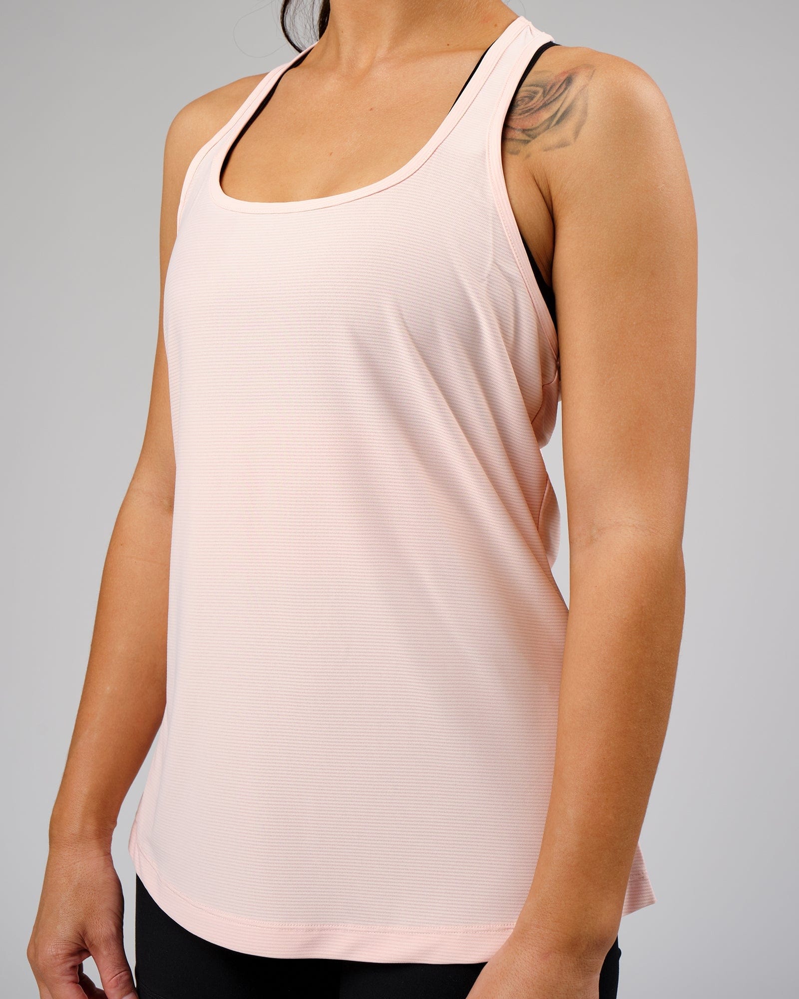 Model wearing Freedom Performance Tank - Pink