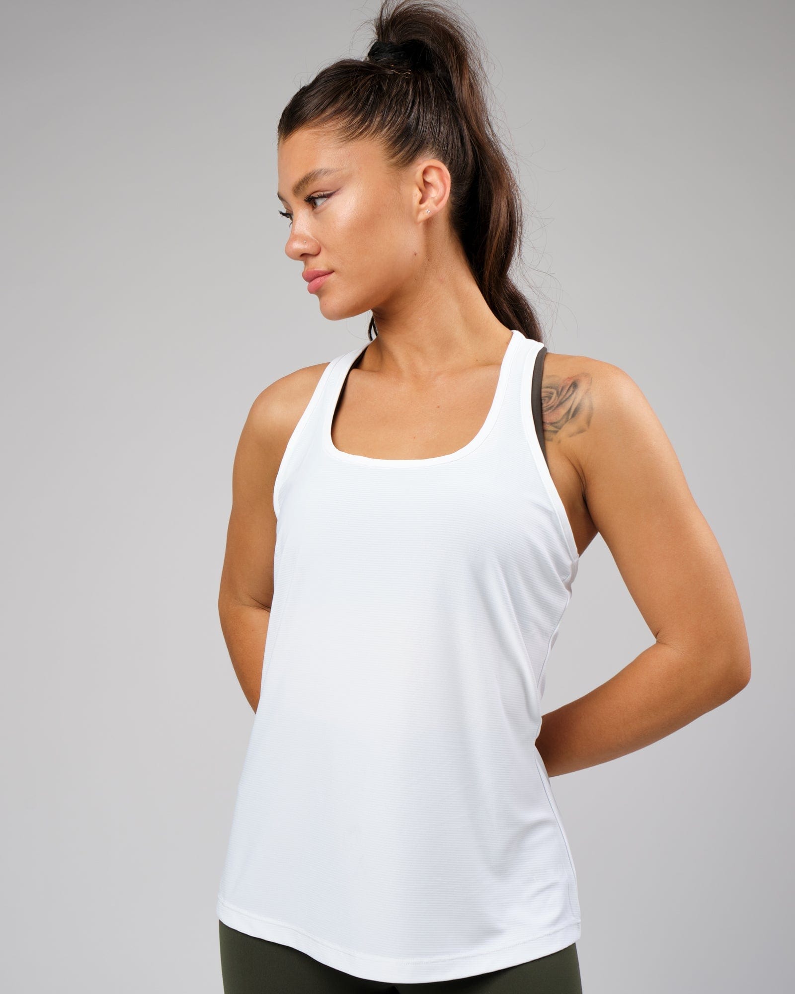 Model wearing Freedom Performance Tank - White