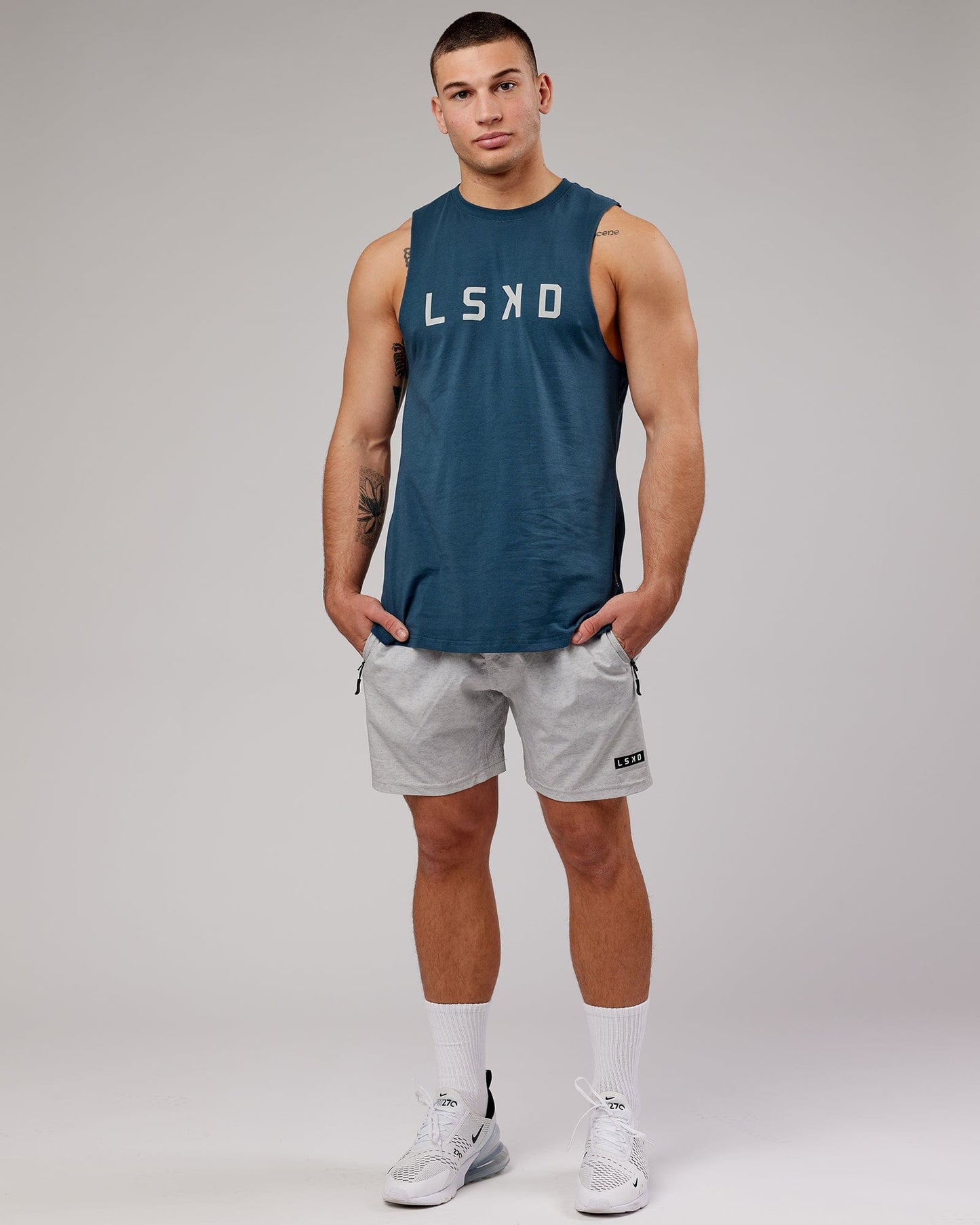 Model wearing Power FLXDRY Training Fit Performance Tank - Light Navy