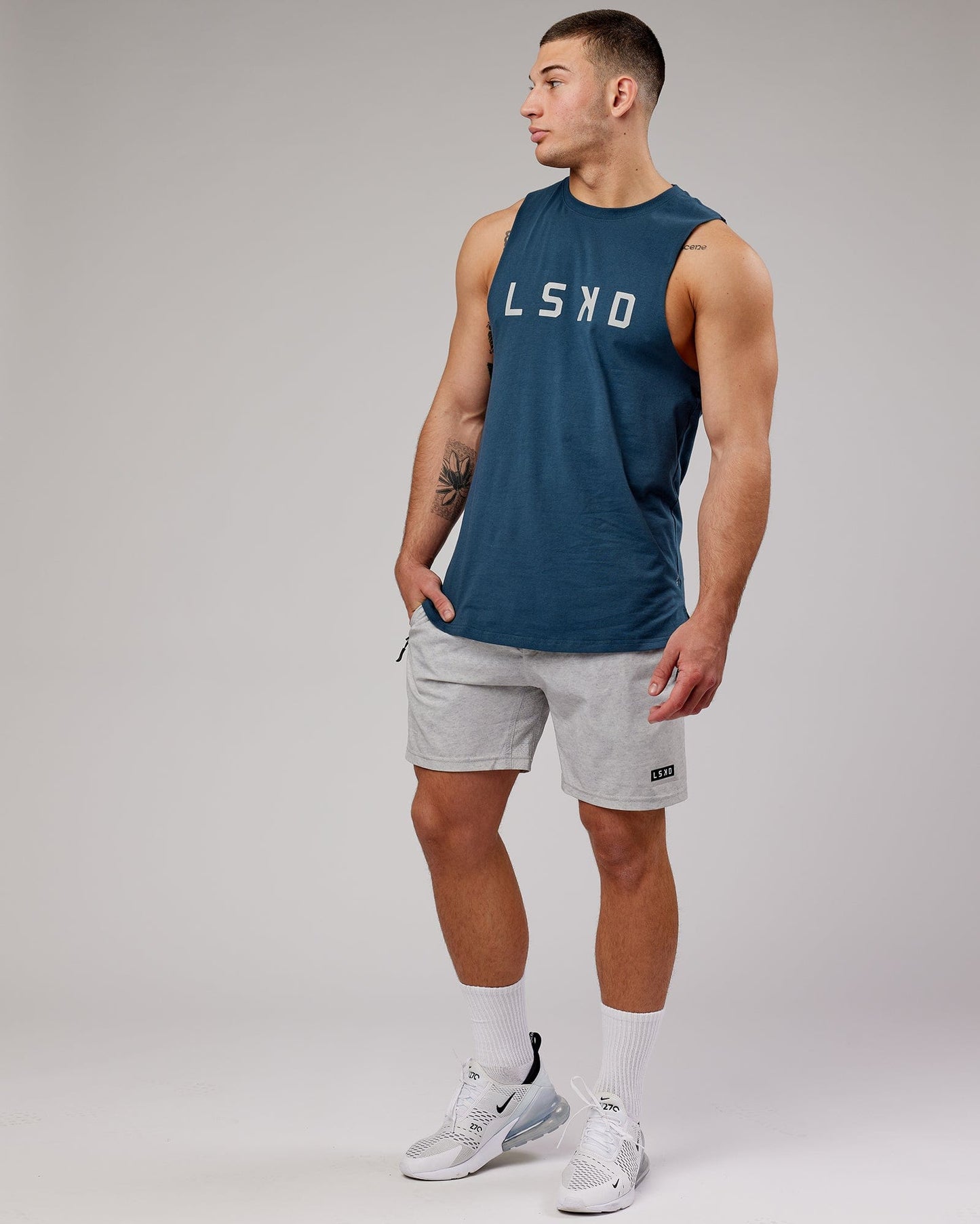Model wearing Power FLXDRY Training Fit Performance Tank - Light Navy