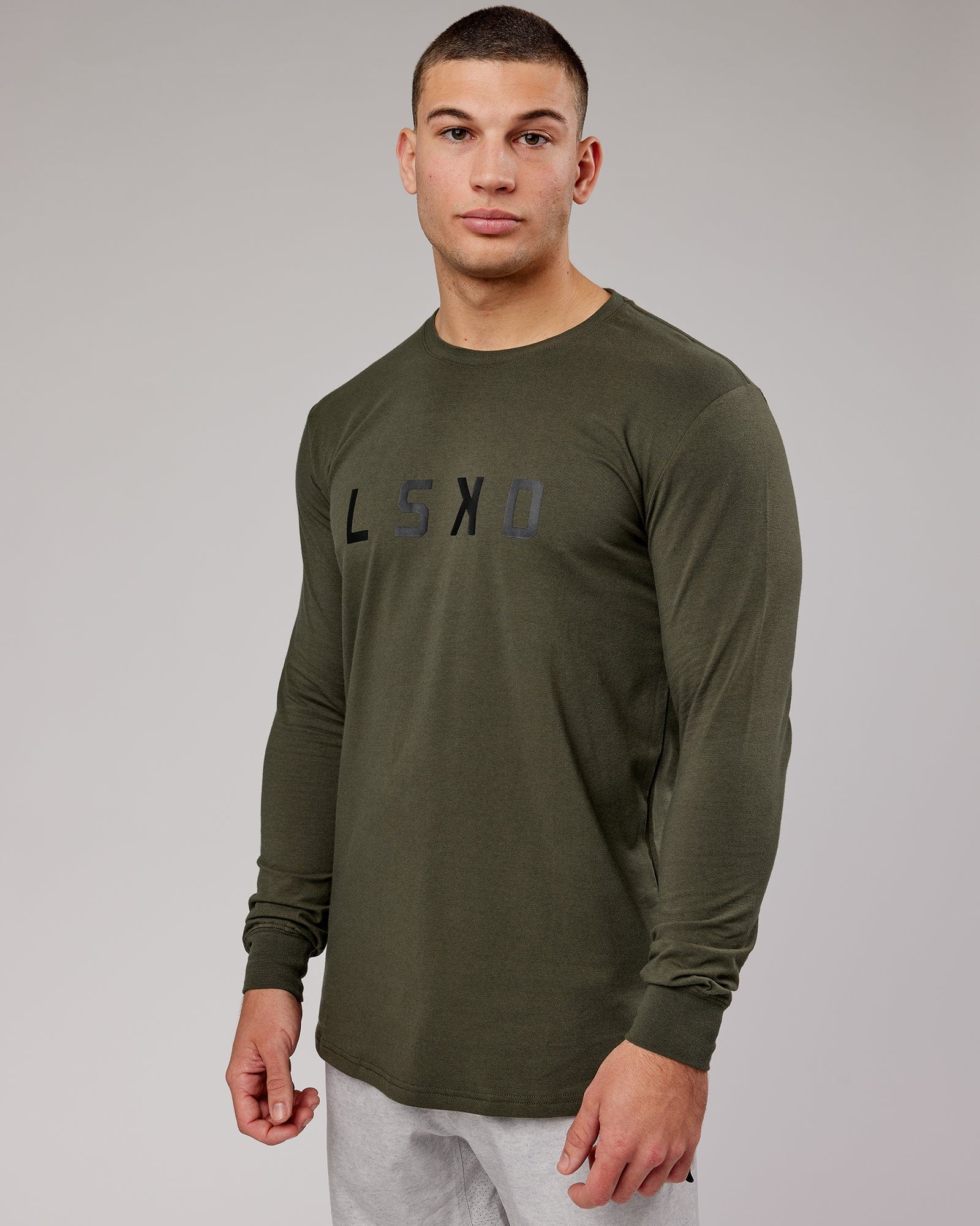 Model wearing Power FLXDRY Performance LS Tee - Forest Night