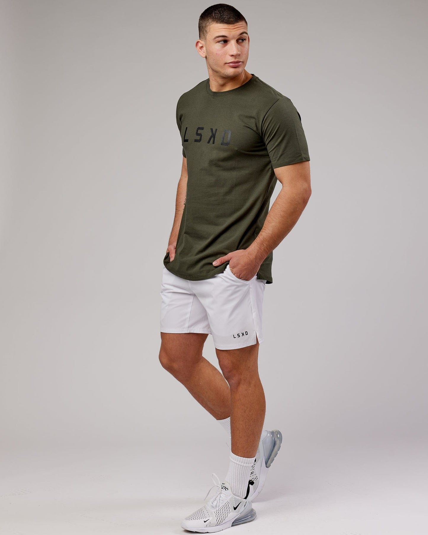 Model wearing Power FLXDRY Performance Tee - Forest Night
