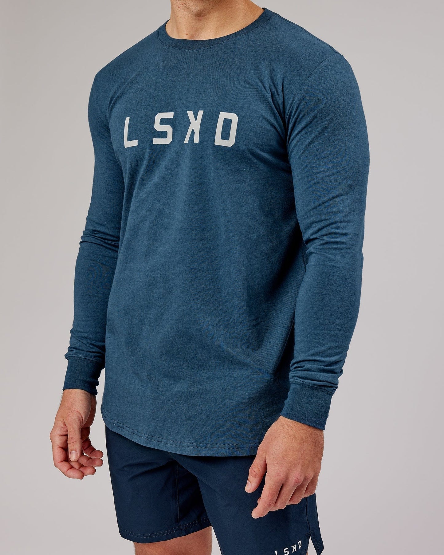 Model wearing Power FLXDRY Performance LS Tee - Light Navy