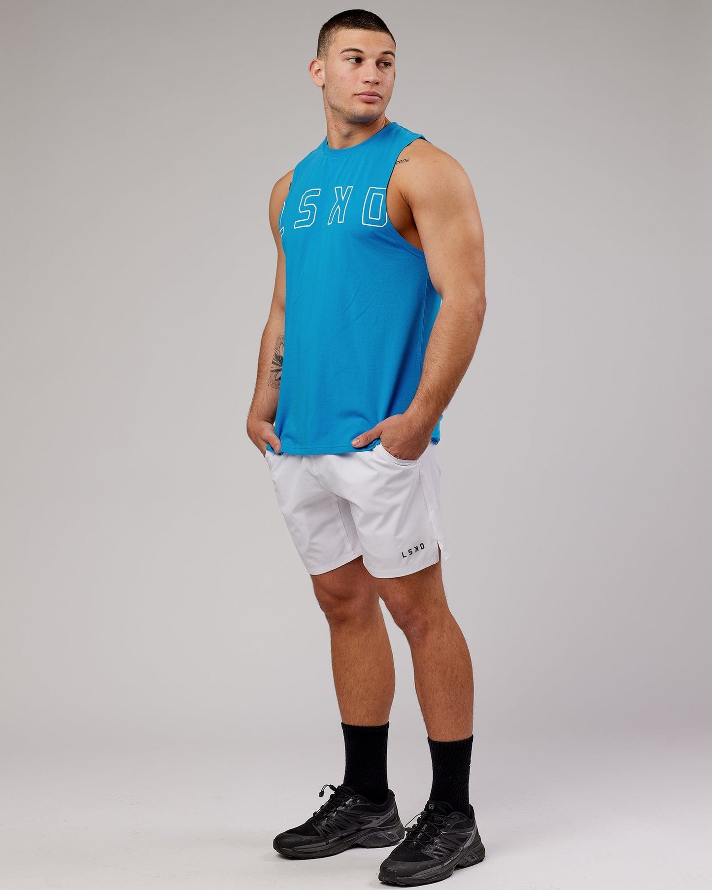 Model wearing Expand FLXCotton Training Fit Tank - Ibiza Blue