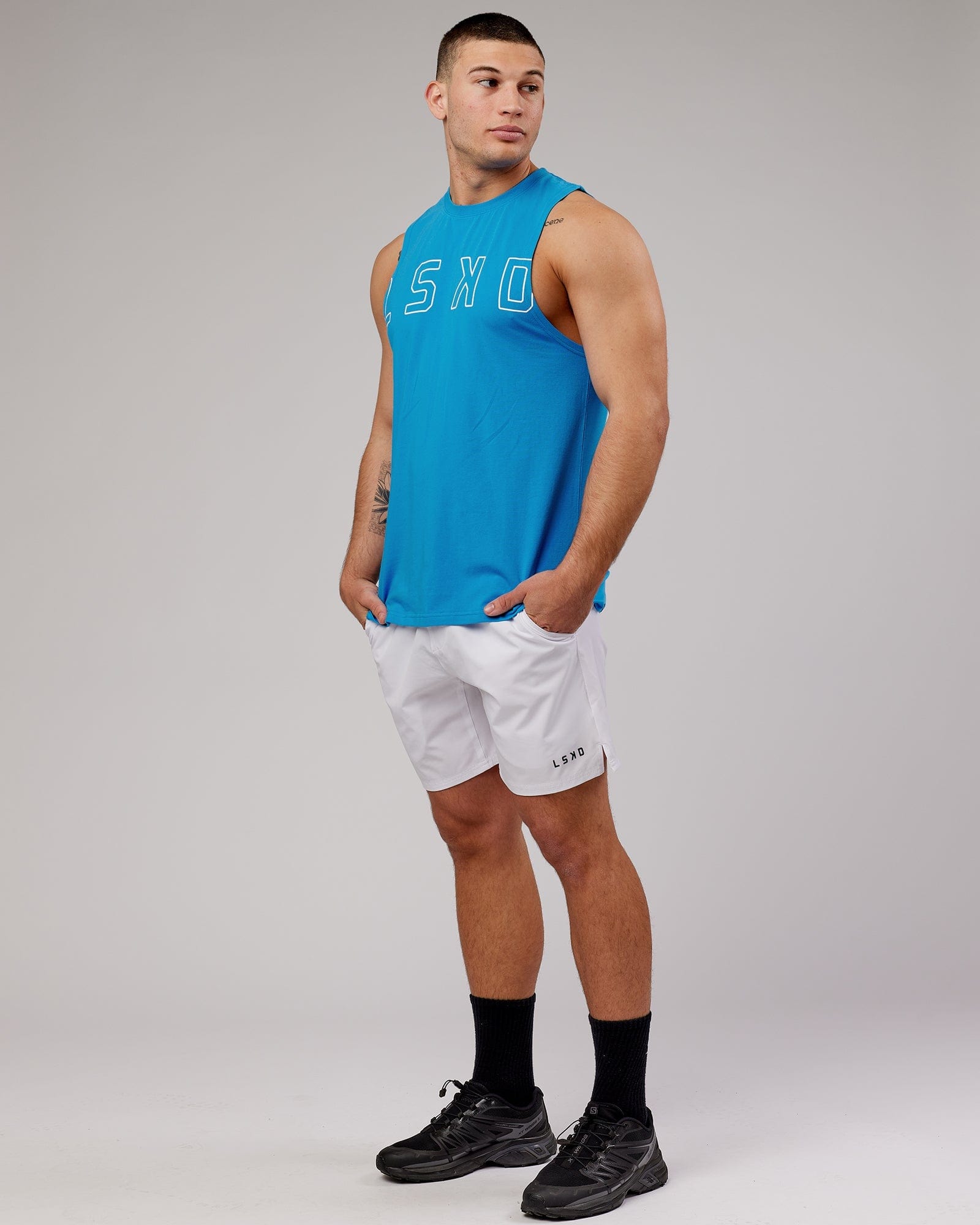 Model wearing Expand FLXCotton Training Fit Tank - Ibiza Blue