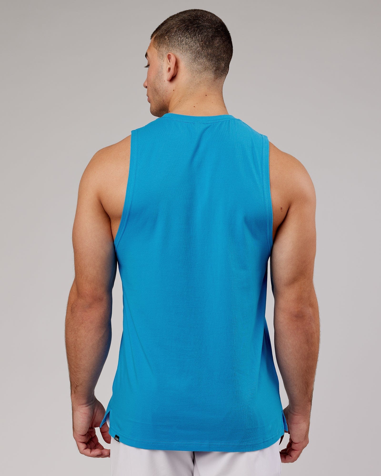 Model wearing Expand FLXCotton Training Fit Tank - Ibiza Blue