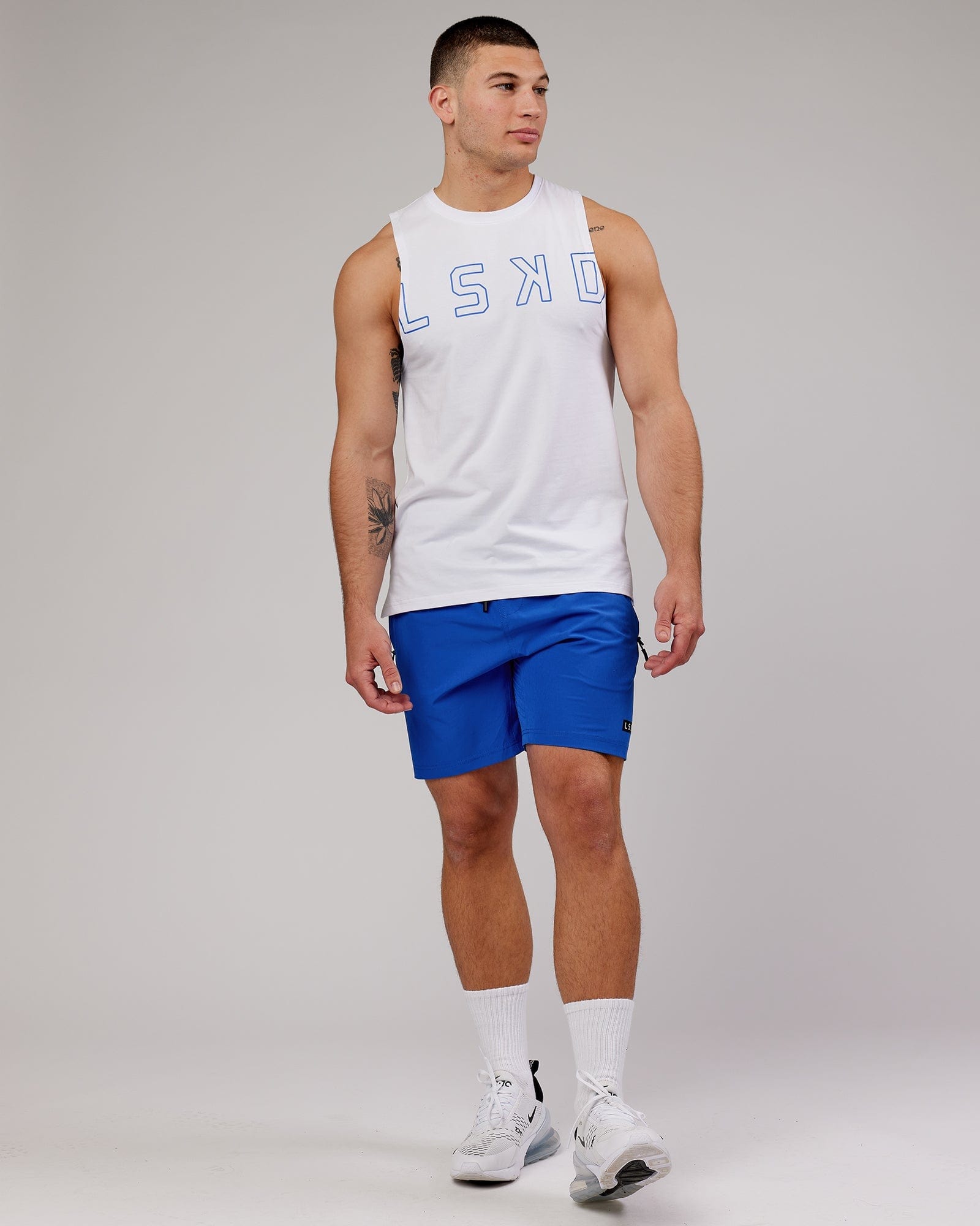 Model wearing Expand FLXCotton Training Fit Tank - White-Cobalt