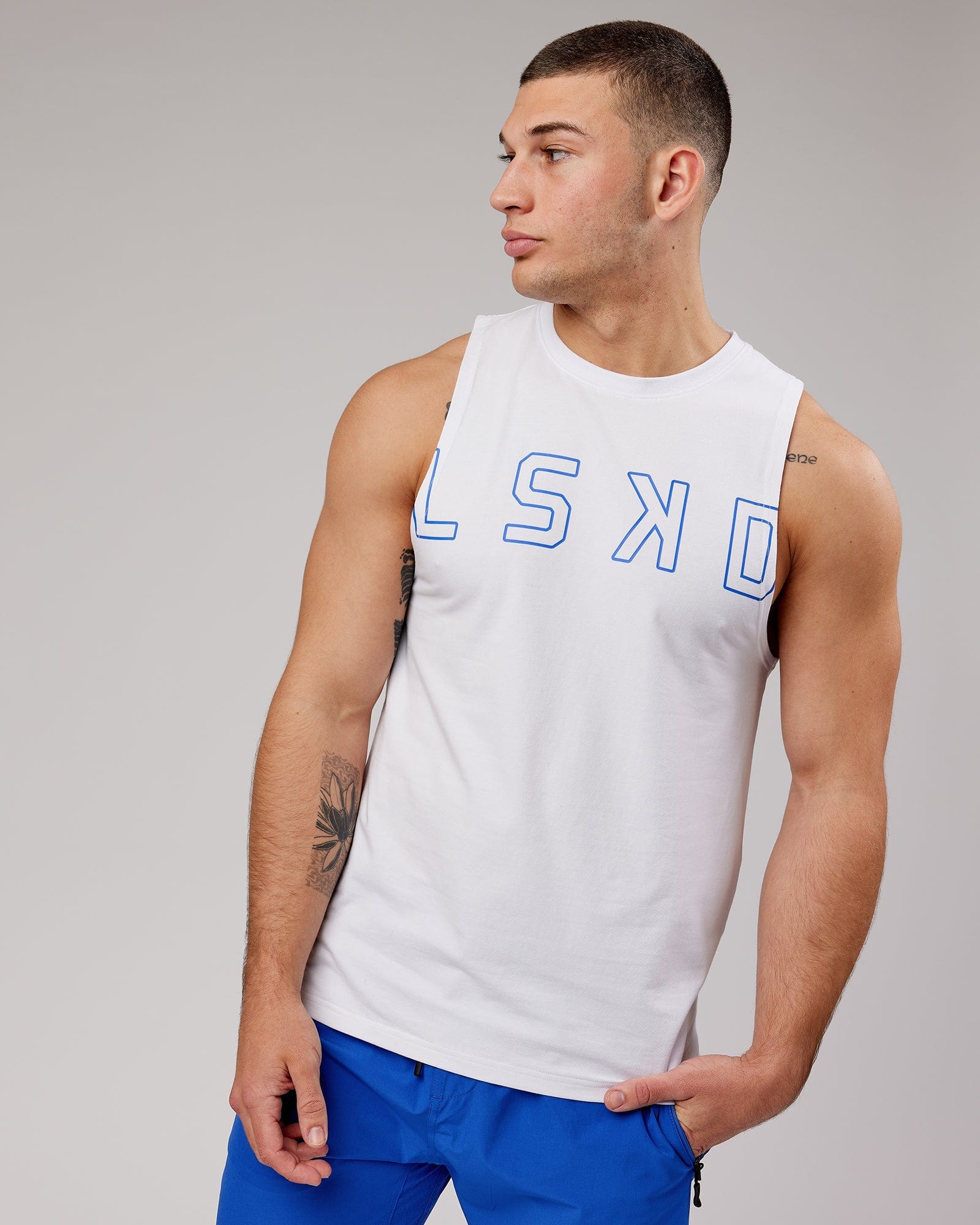 Model wearing Expand FLXCotton Training Fit Tank - White-Cobalt