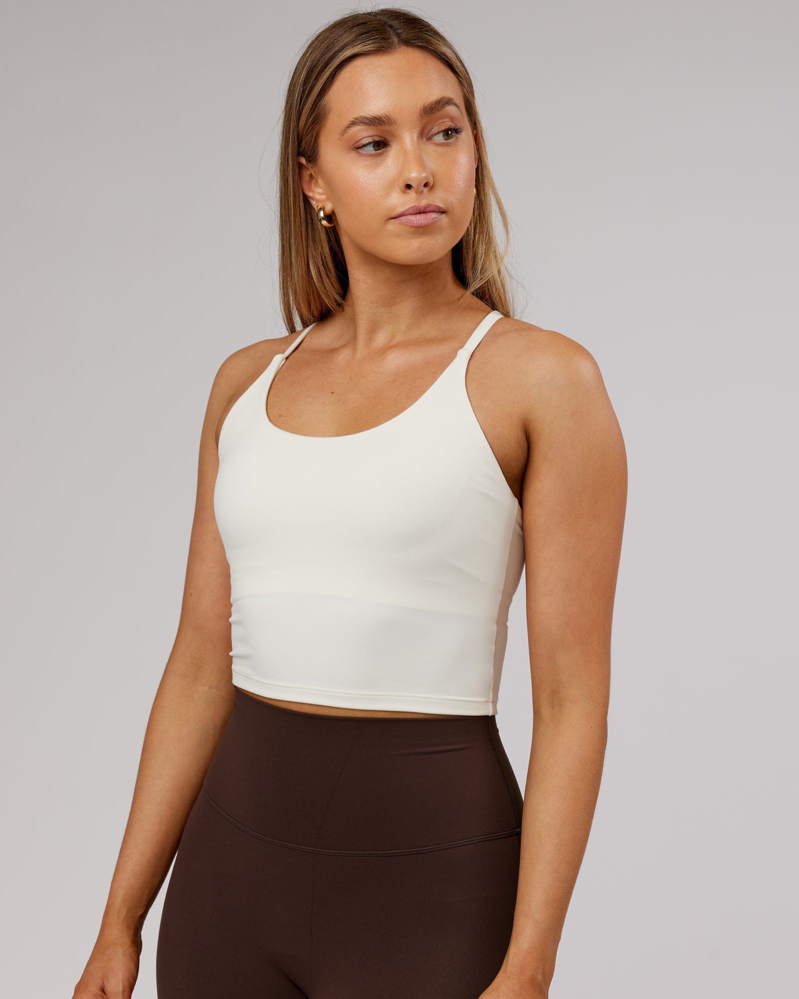 Model wearing Elixir Active Tank - Cream