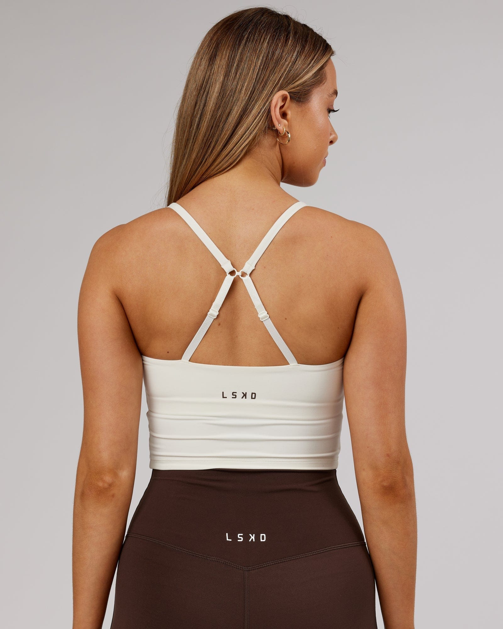 Model wearing Elixir Active Tank - Cream