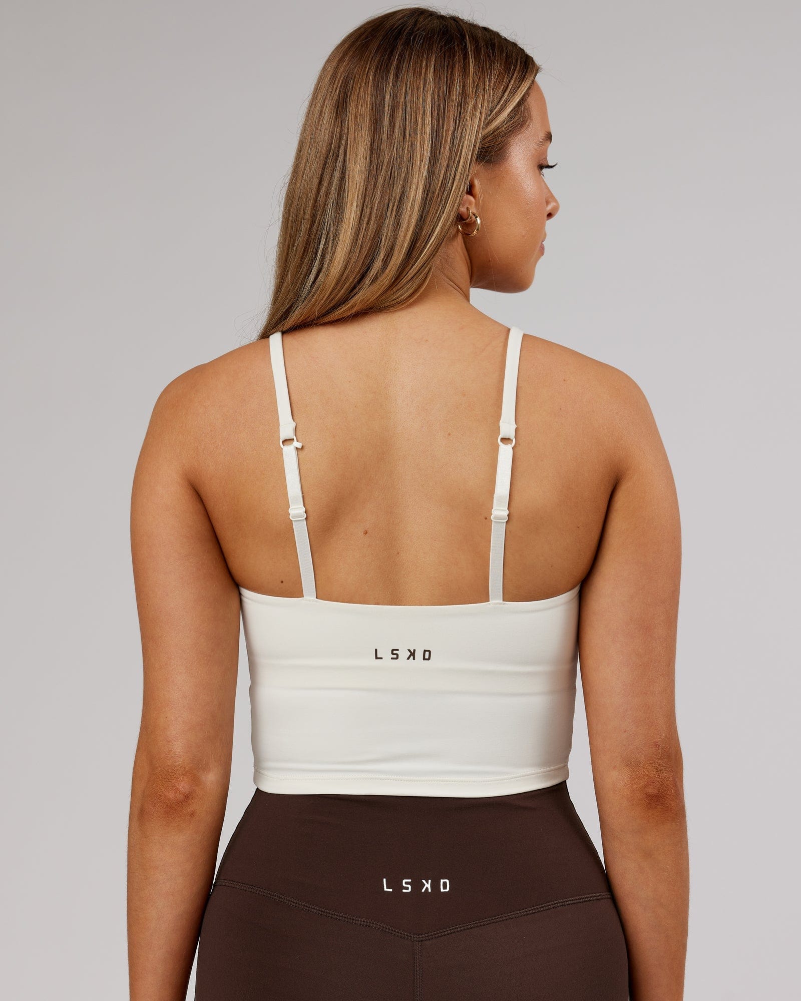 Model wearing Elixir Active Tank - Cream