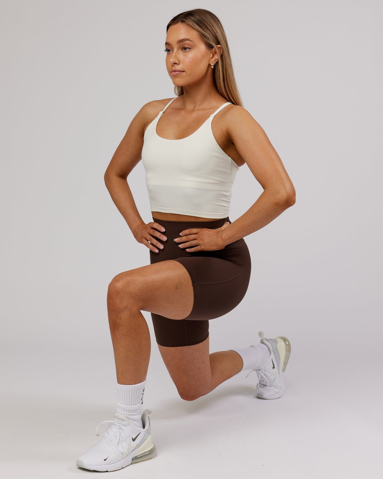 Model wearing Elixir Active Tank - Cream