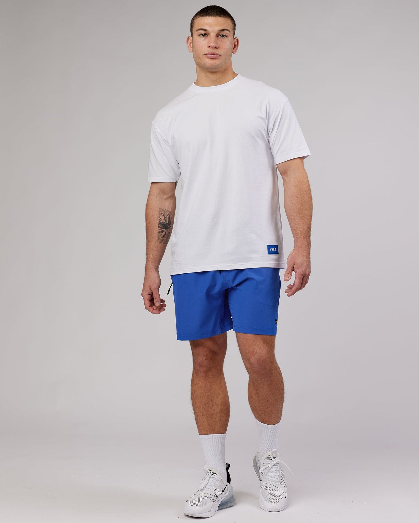 Model wearing Transfer FLXCotton Tee Oversize - White