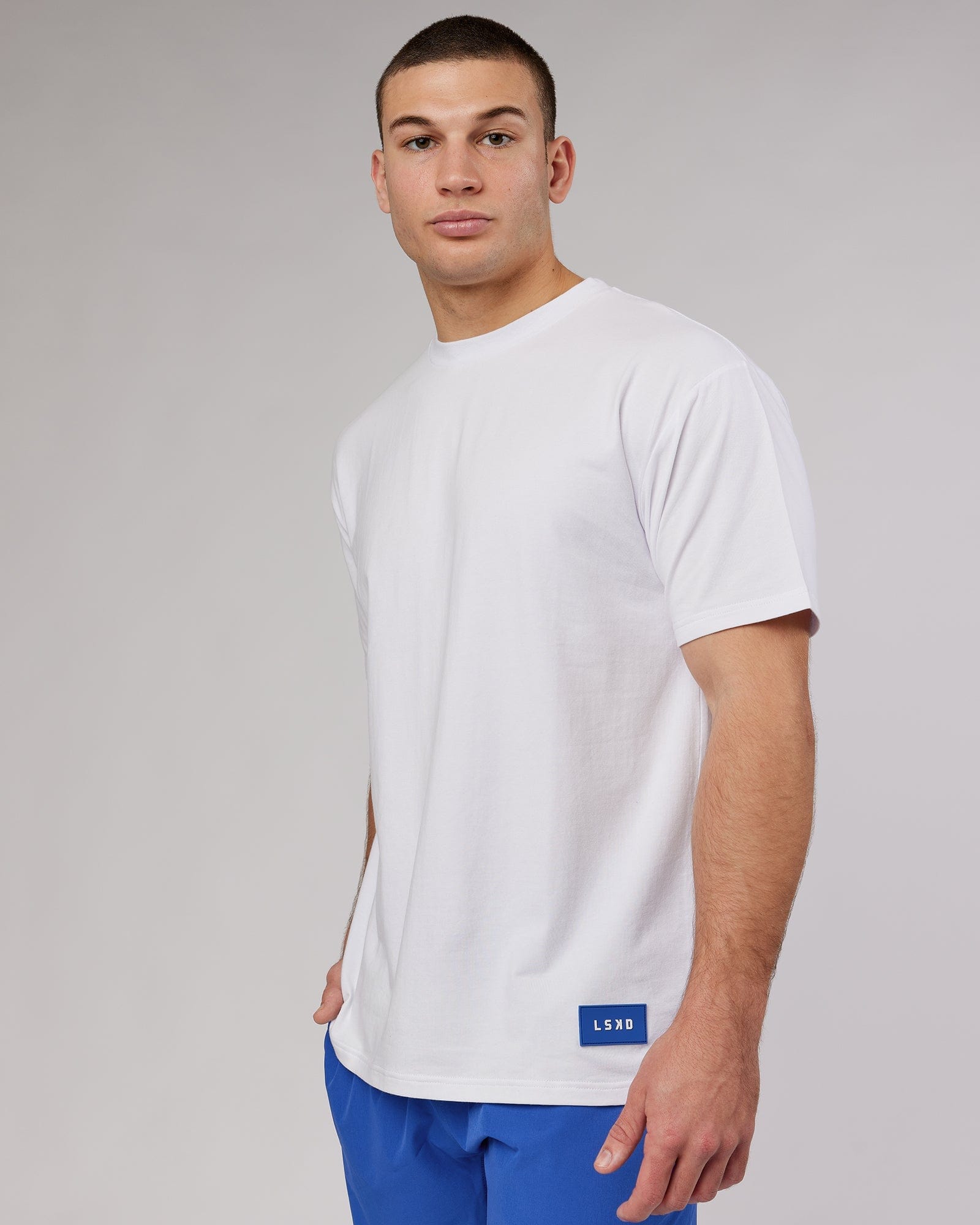 Model wearing Transfer FLXCotton Tee Oversize - White
