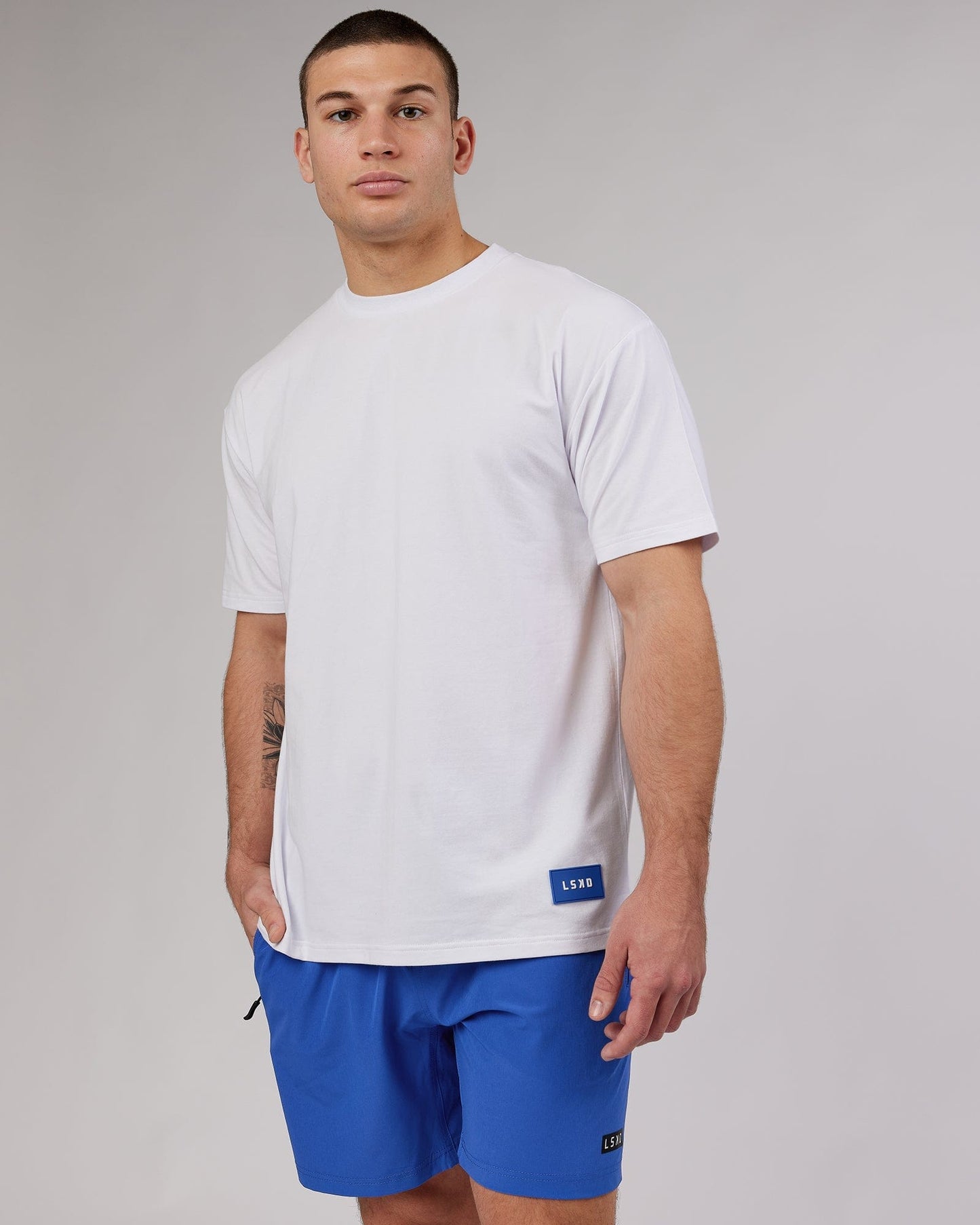 Model wearing Transfer FLXCotton Tee Oversize - White